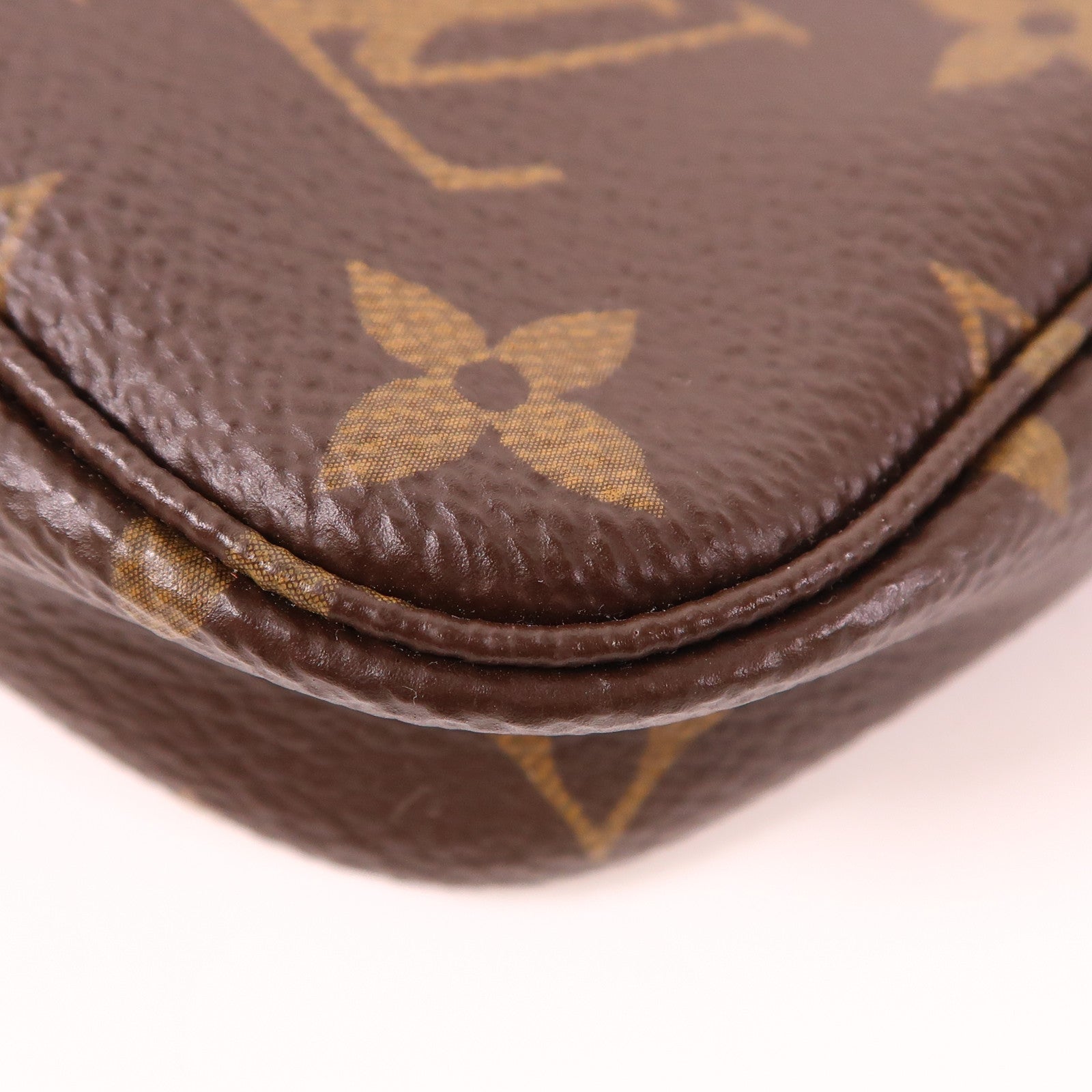 LOUIS VUITTON Monogram Mini Pochette Accessoires金扣手挽袋