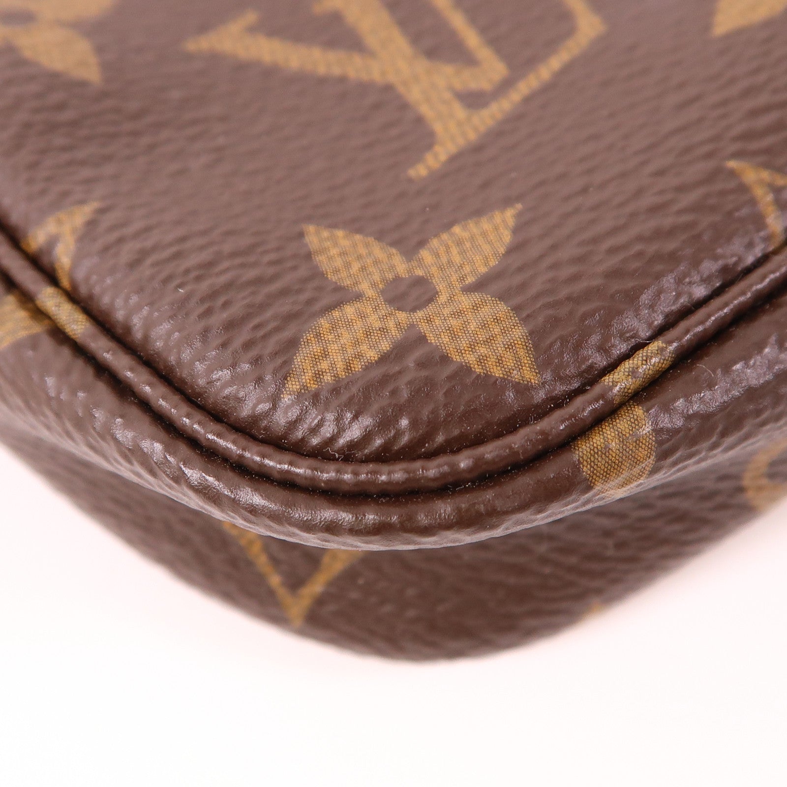LOUIS VUITTON Monogram Mini Pochette Accessoires金扣手挽袋