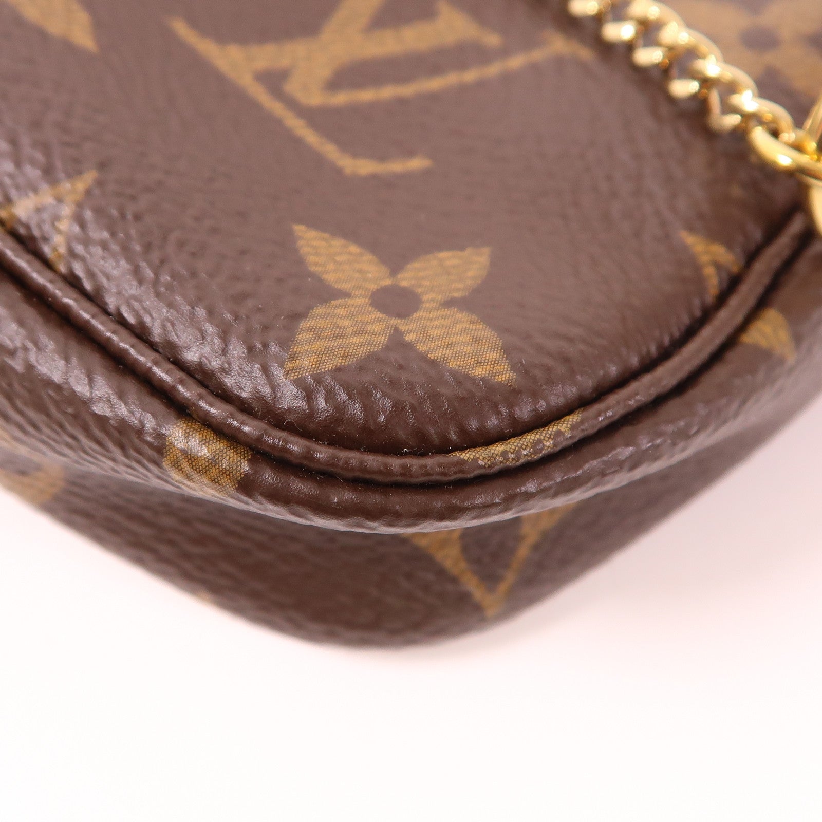 LOUIS VUITTON Monogram Mini Pochette Accessoires金扣手挽袋