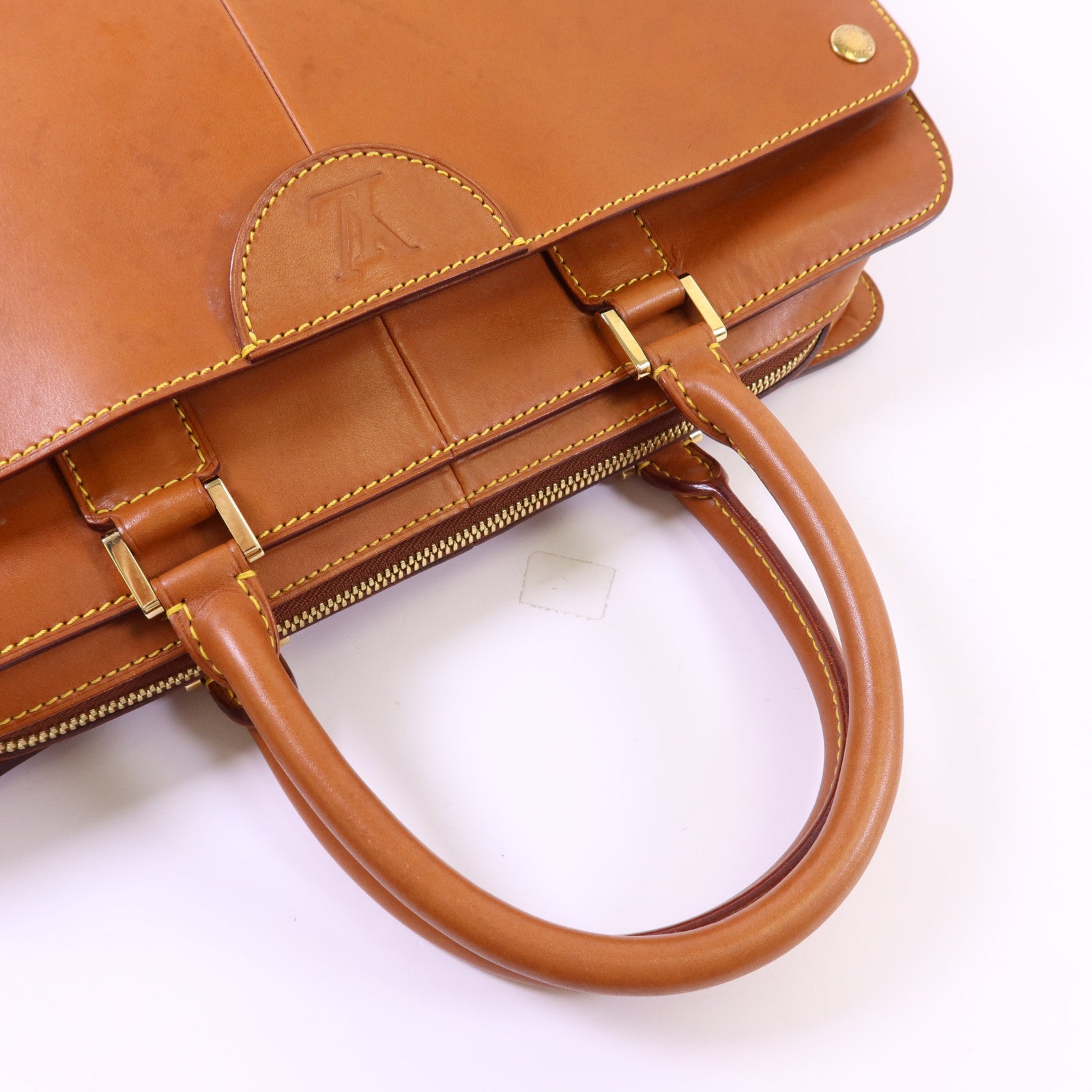 LOUIS VUITTON Nomad皮革Nomad Negev金扣手挽袋