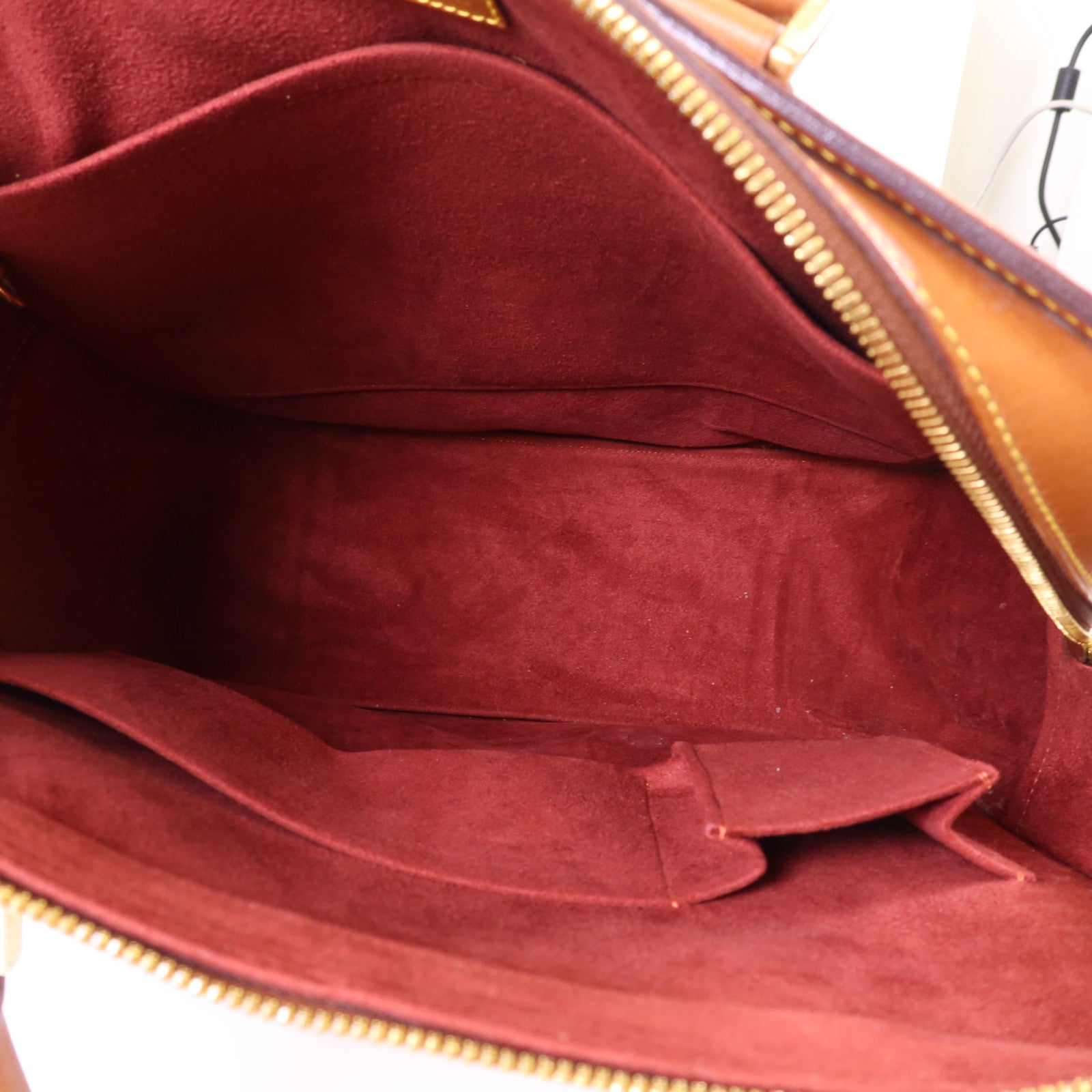 LOUIS VUITTON Nomad皮革Nomad Negev金扣手挽袋