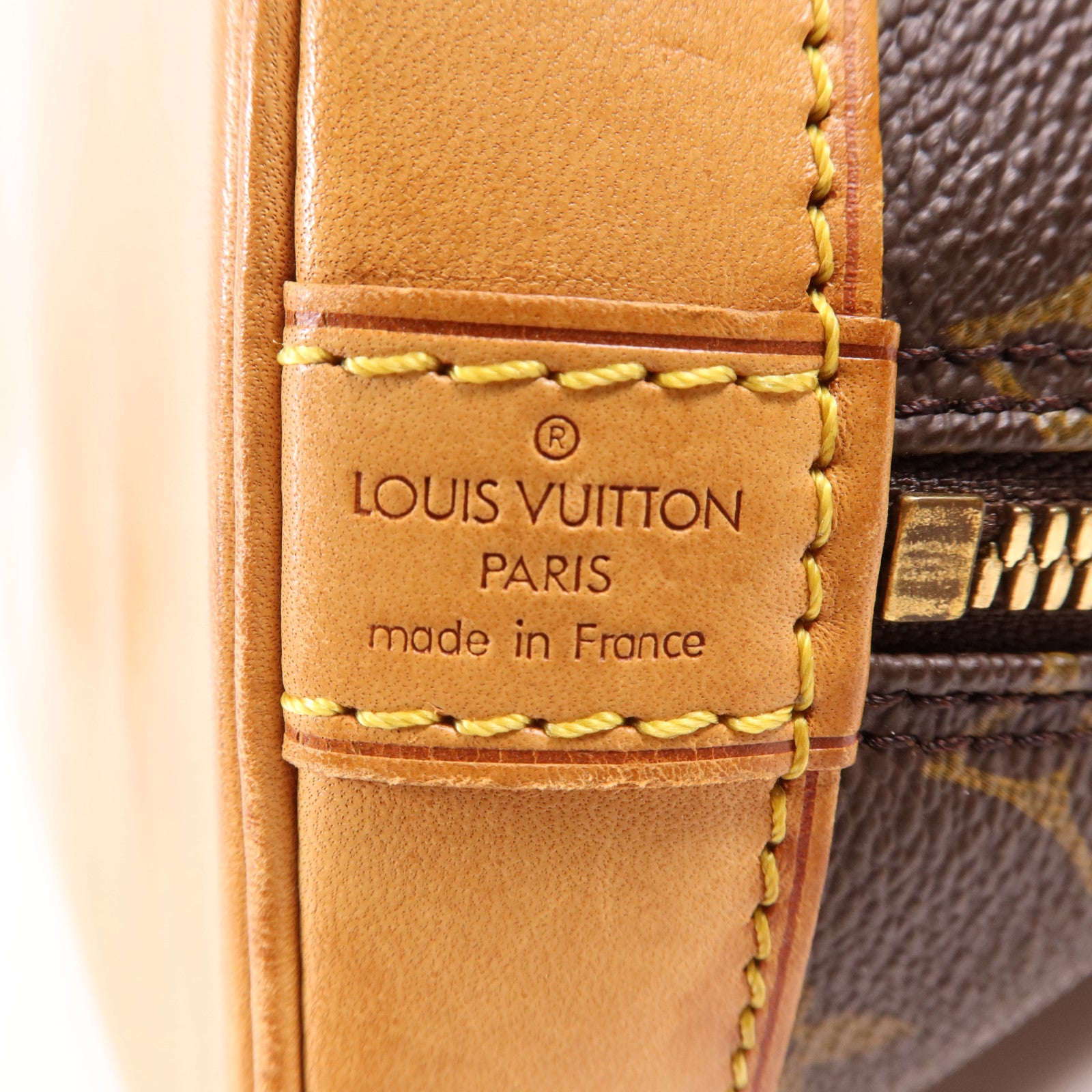 LOUIS VUITTON Monogram Alma PM金扣手挽袋棕色