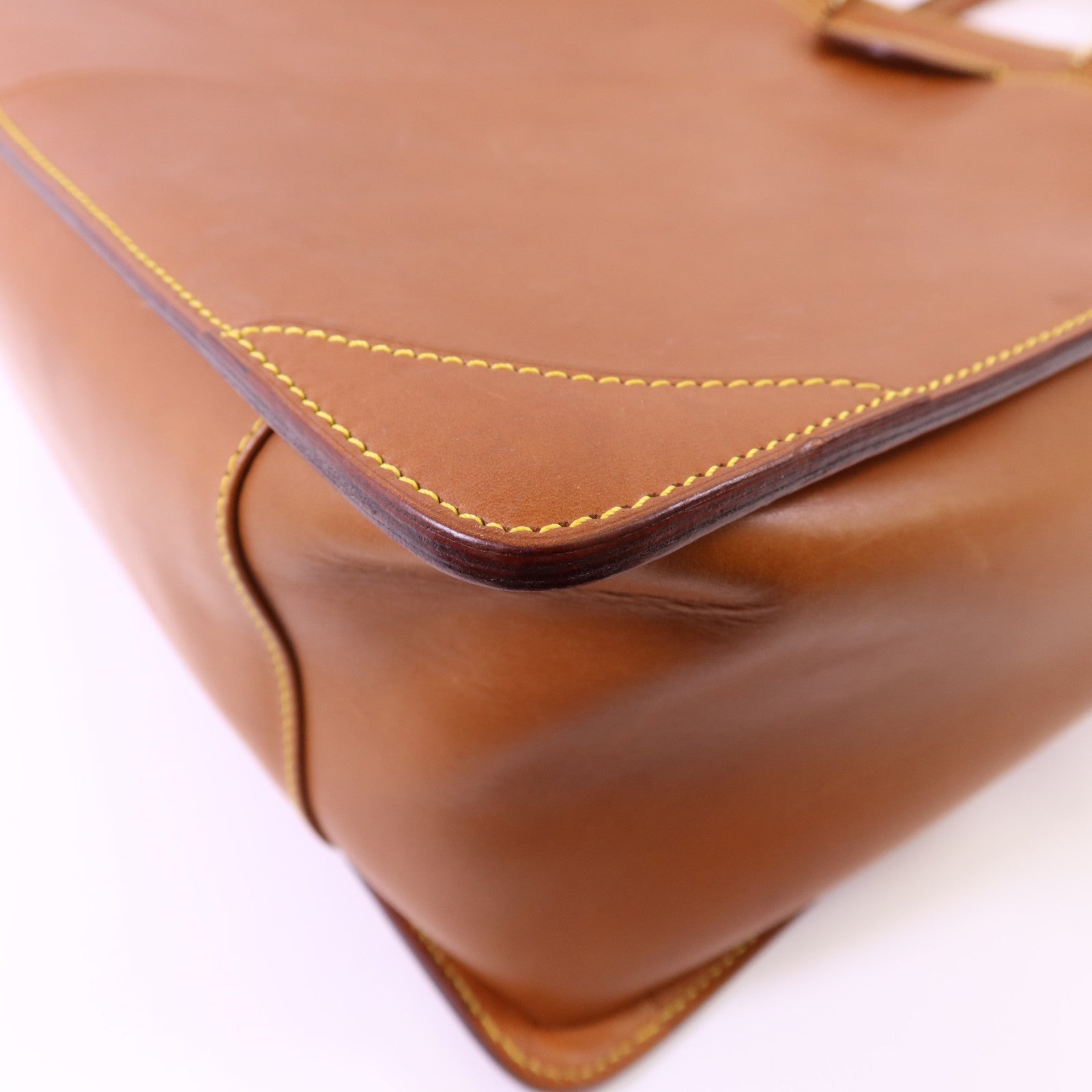 LOUIS VUITTON Nomad皮革Nomad Negev金扣手挽袋