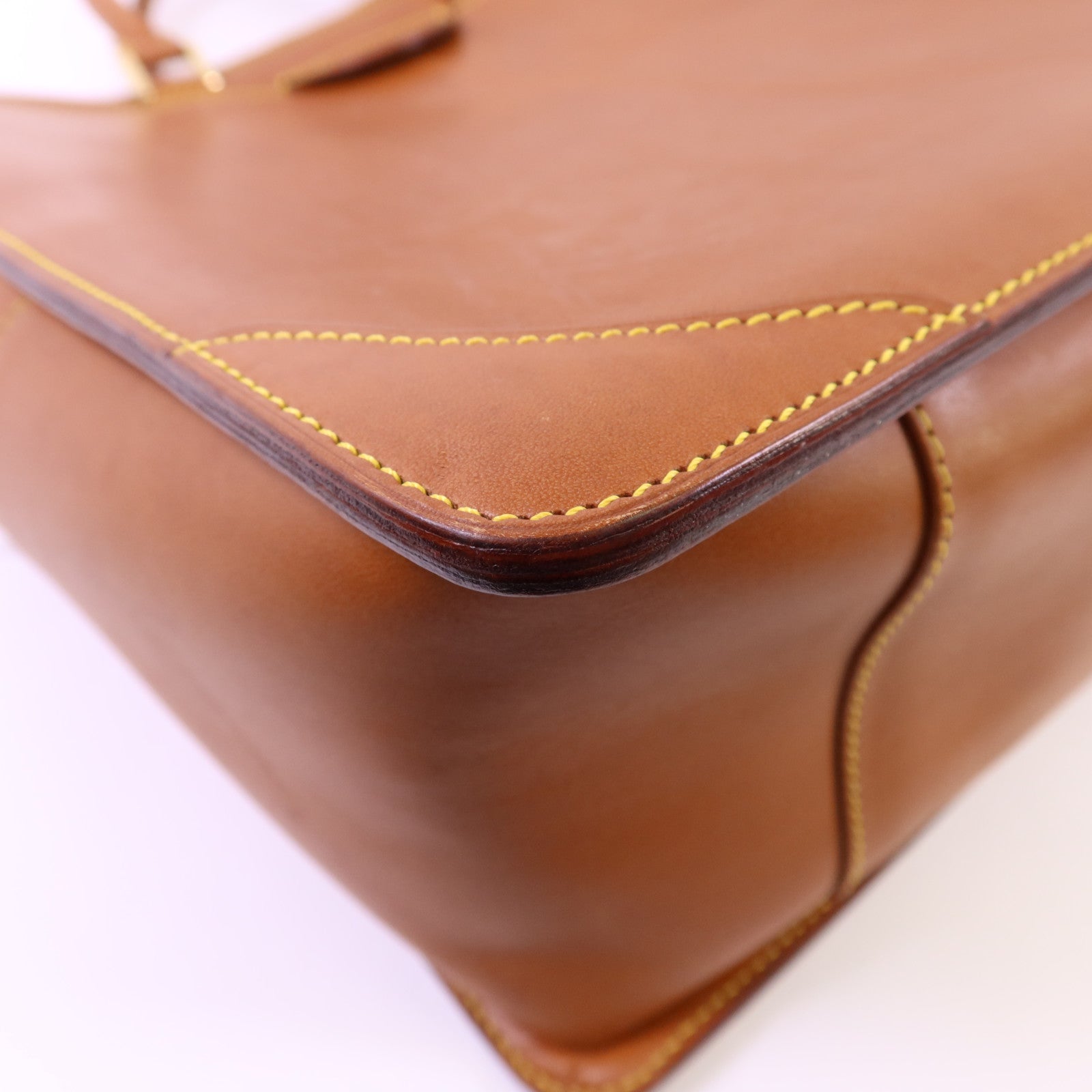 LOUIS VUITTON Nomad皮革Nomad Negev金扣手挽袋