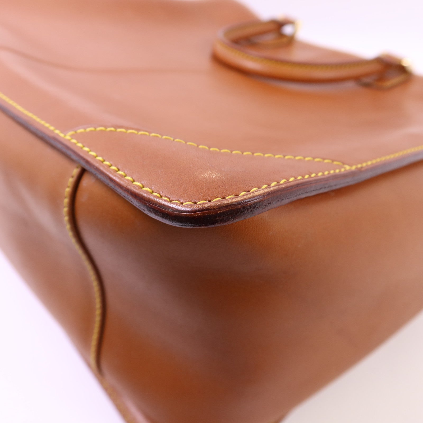LOUIS VUITTON Nomad皮革Nomad Negev金扣手挽袋