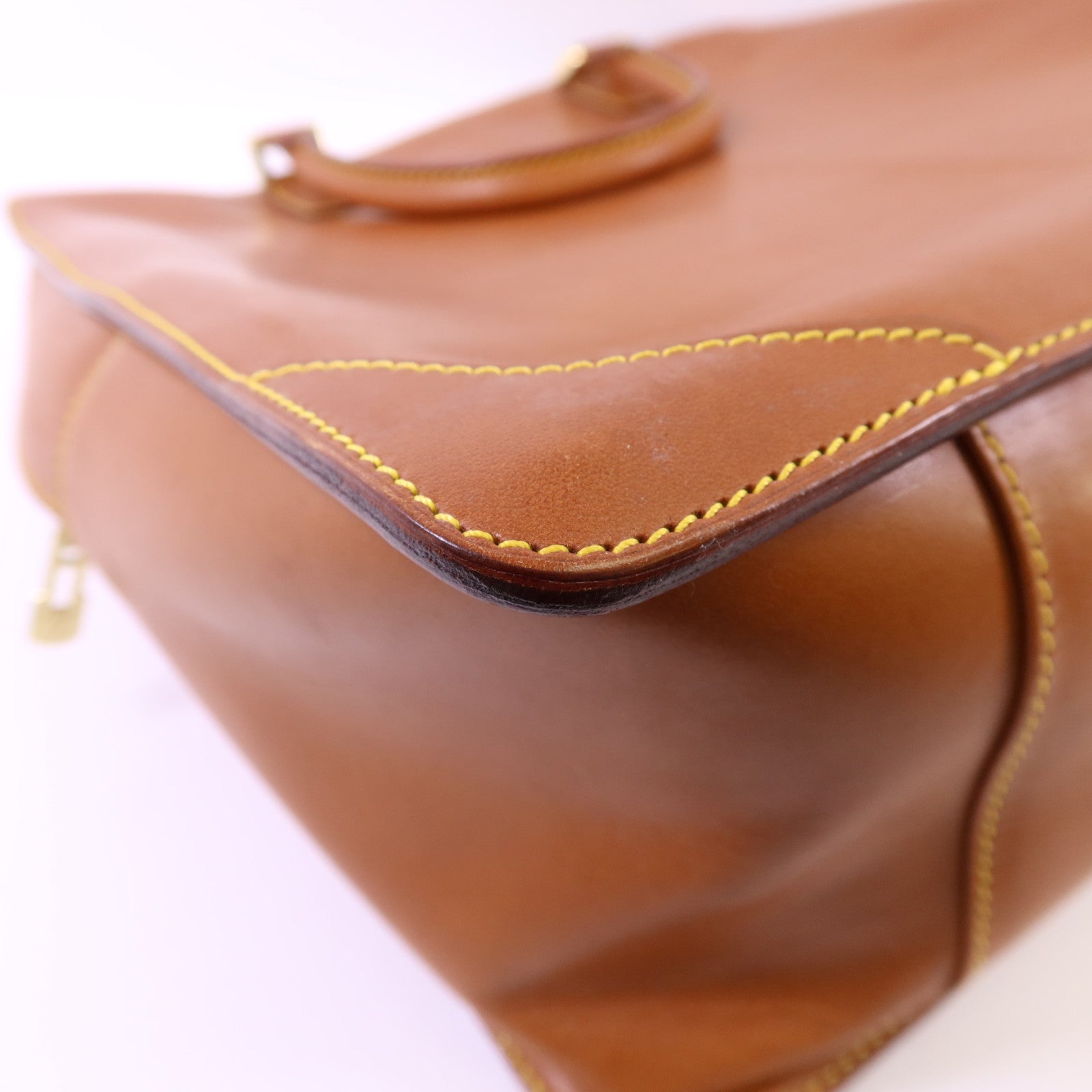 LOUIS VUITTON Nomad皮革Nomad Negev金扣手挽袋