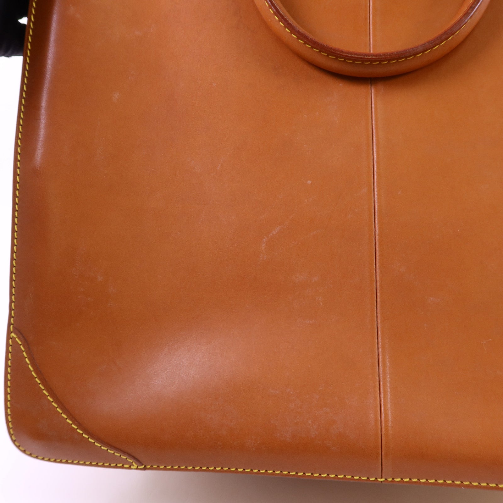 LOUIS VUITTON Nomad皮革Nomad Negev金扣手挽袋