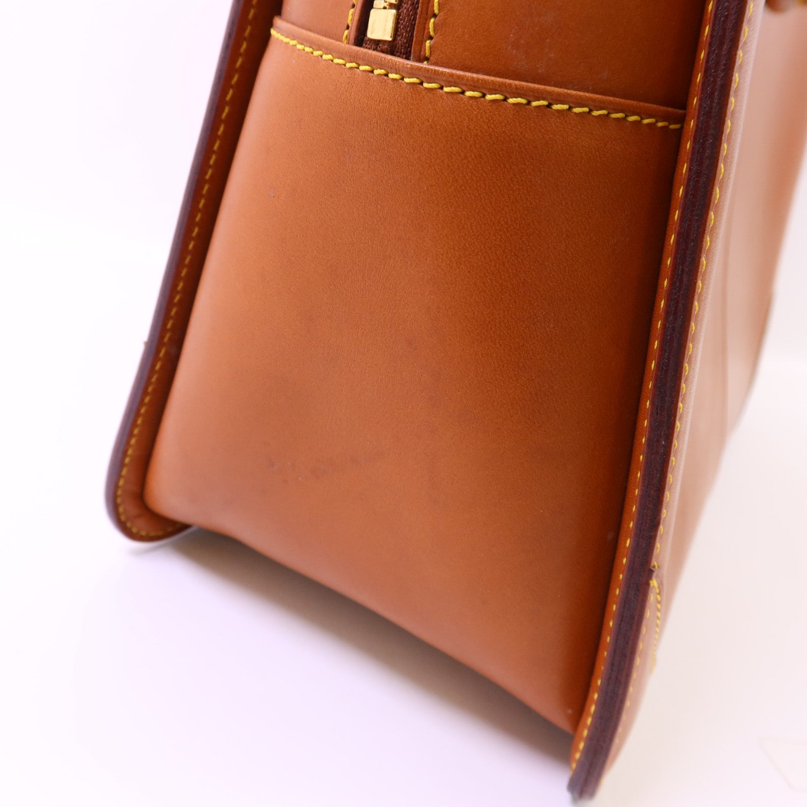 LOUIS VUITTON Nomad皮革Nomad Negev金扣手挽袋