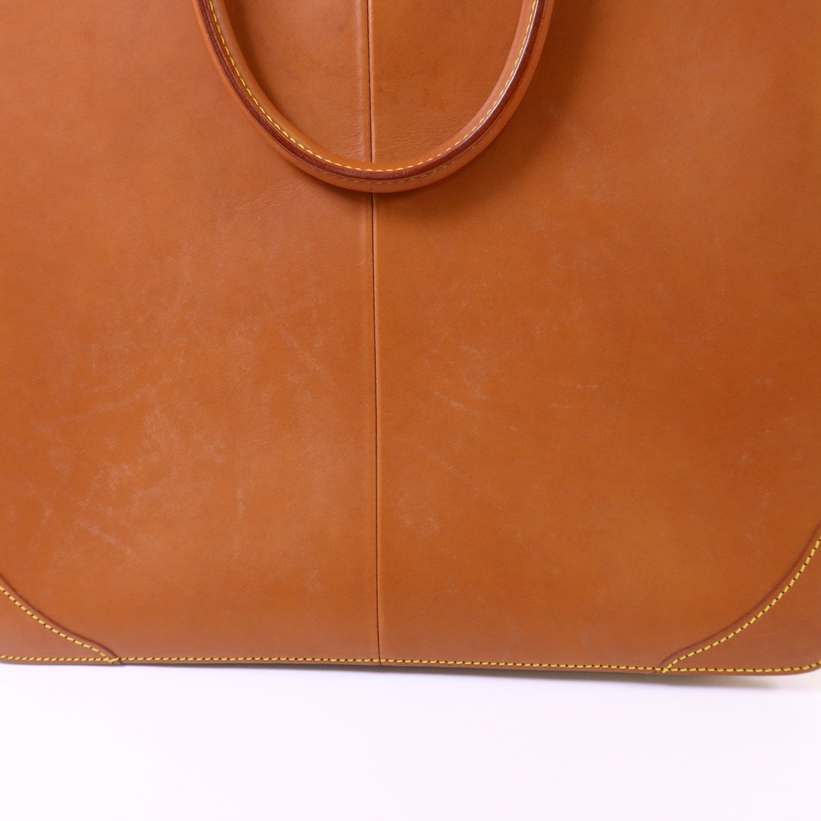 LOUIS VUITTON Nomad皮革Nomad Negev金扣手挽袋