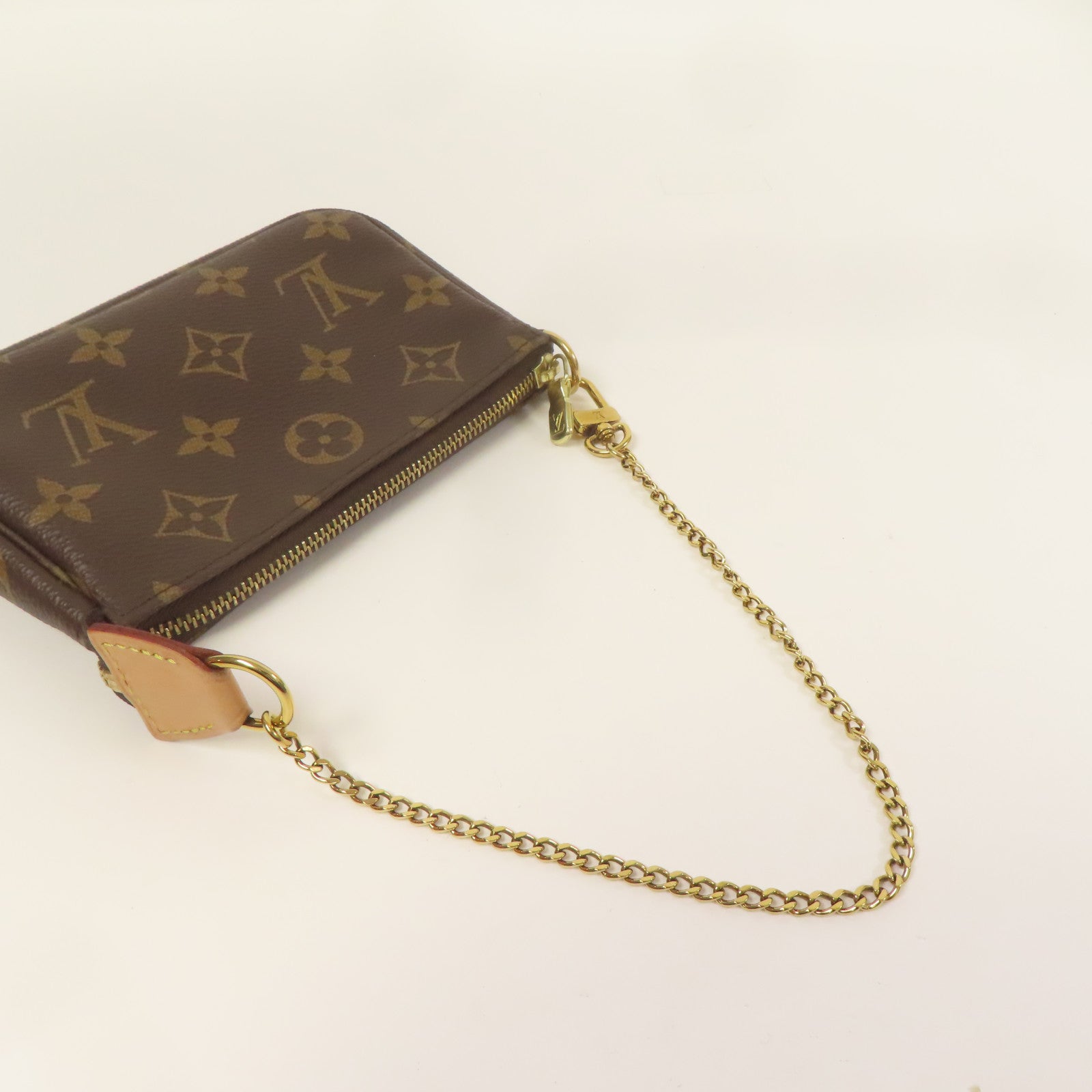 LOUIS VUITTON Monogram Mini Pochette Accessoires金扣手挽袋棕色