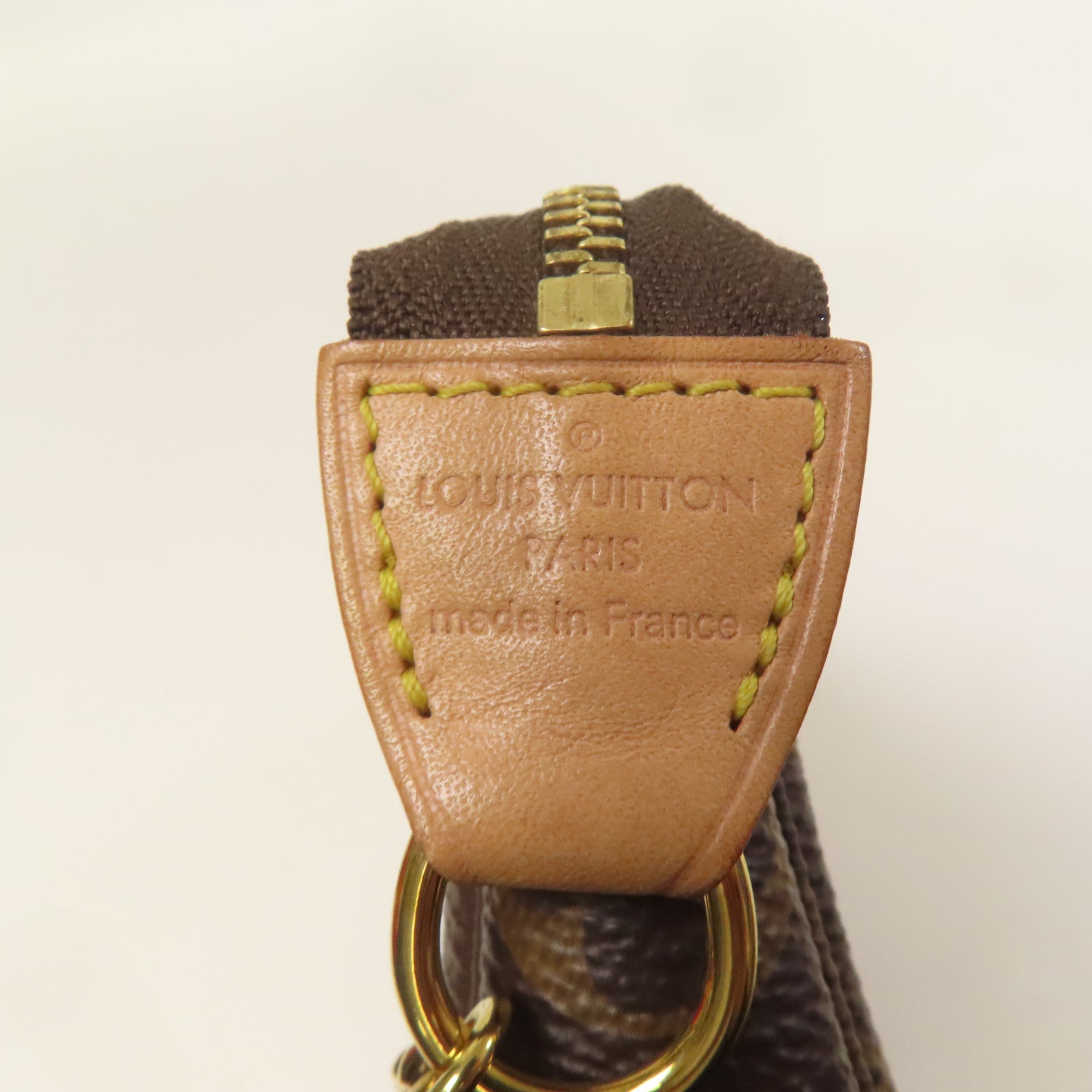 LOUIS VUITTON Monogram Mini Pochette Accessoires金扣手挽袋棕色