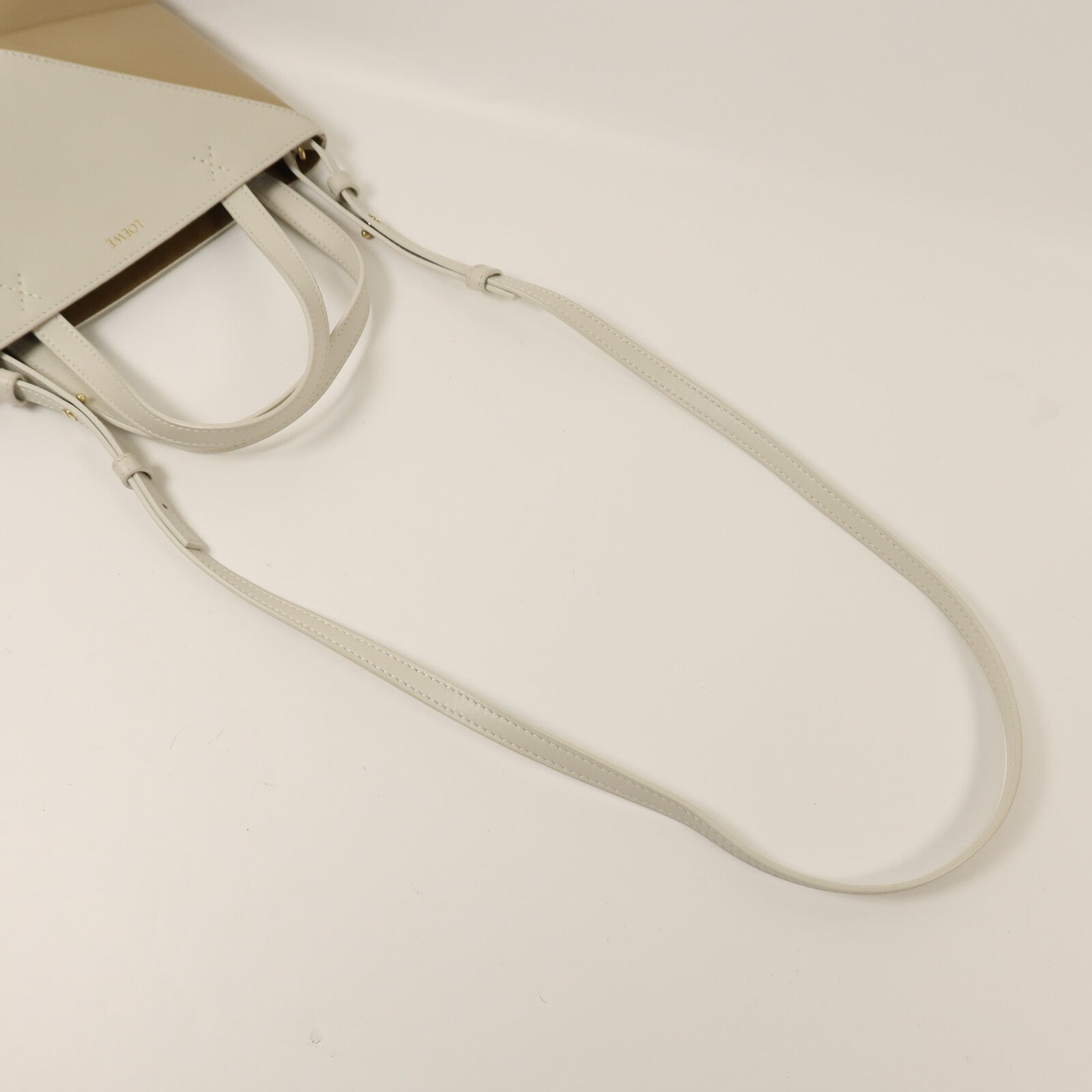 LOEWE 牛皮皮革Puzzle Fold Mini金扣手挽肩背兩用袋