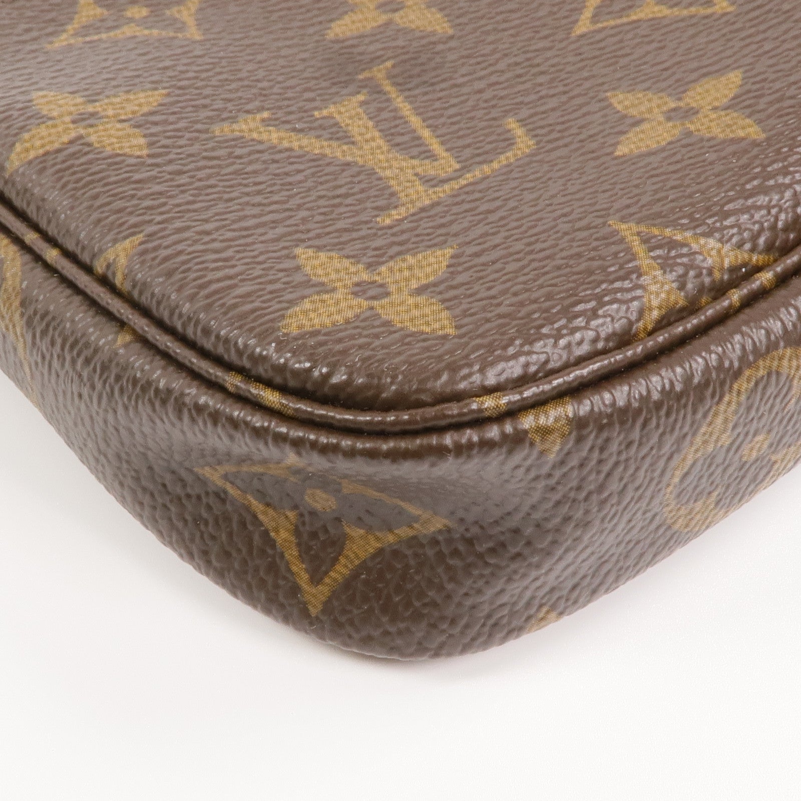 LOUIS VUITTON Monogram Mini Pochette Accessoires金扣手挽袋