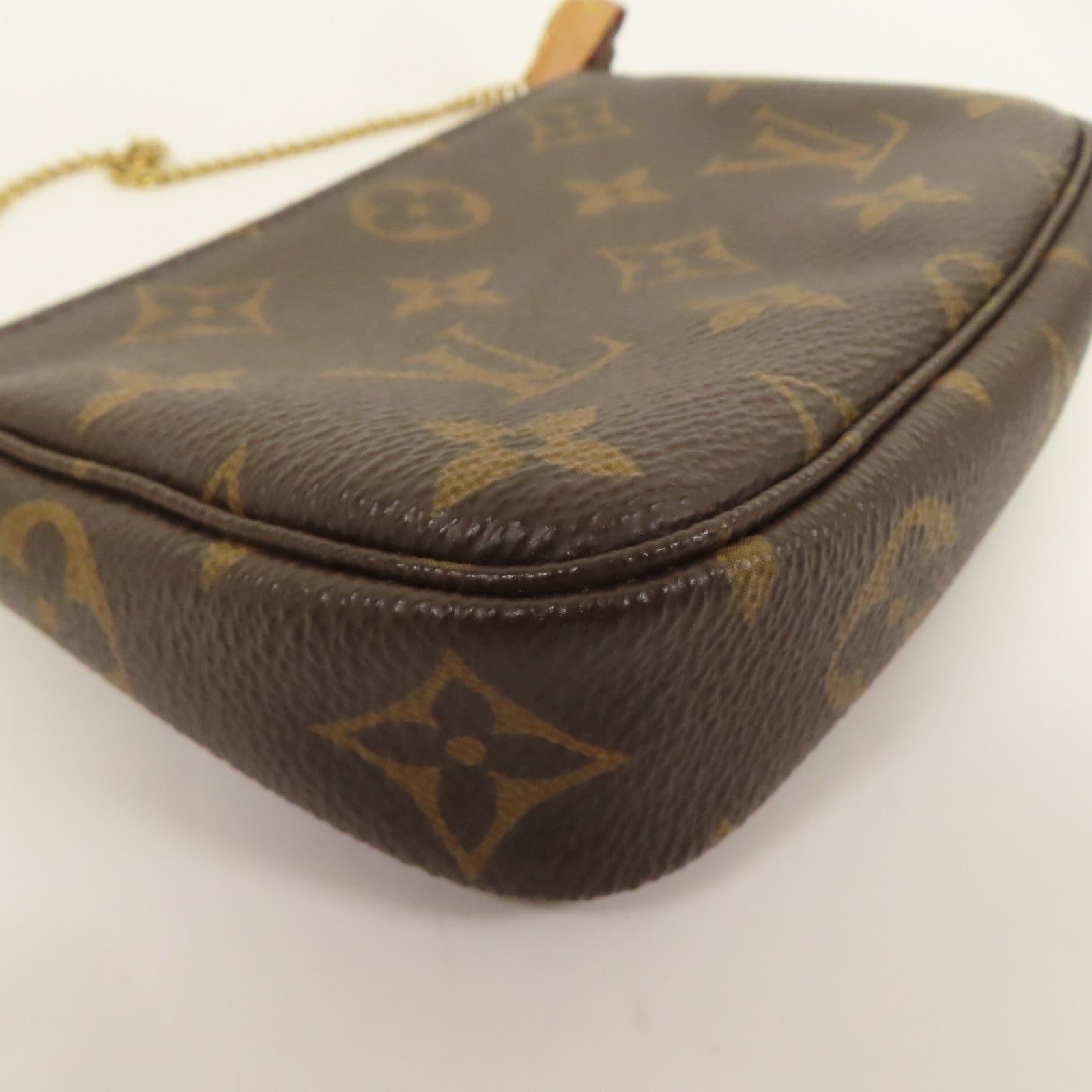 LOUIS VUITTON Monogram Mini Pochette Accessoires金扣手挽袋棕色