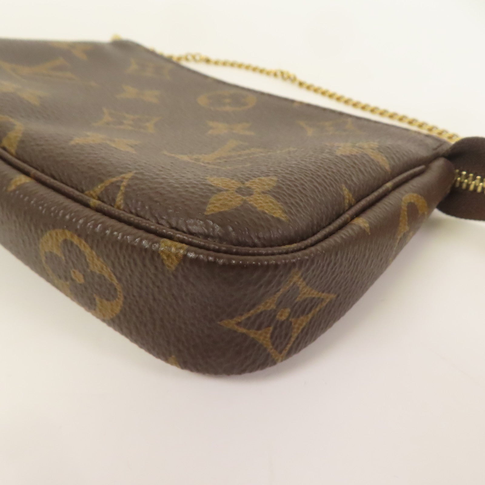 LOUIS VUITTON Monogram Mini Pochette Accessoires金扣手挽袋棕色