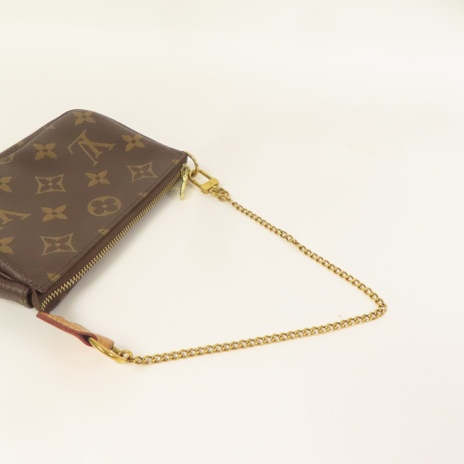 LOUIS VUITTON Monogram Mini Pochette Accessoires金扣手挽袋棕色