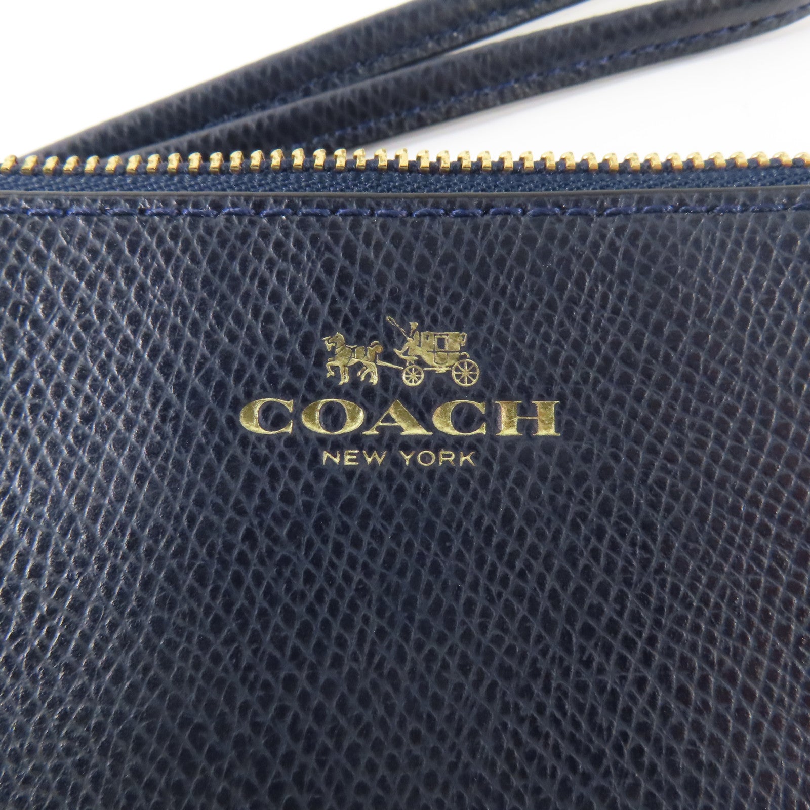 COACH 牛皮皮革Pouch金扣手拿包