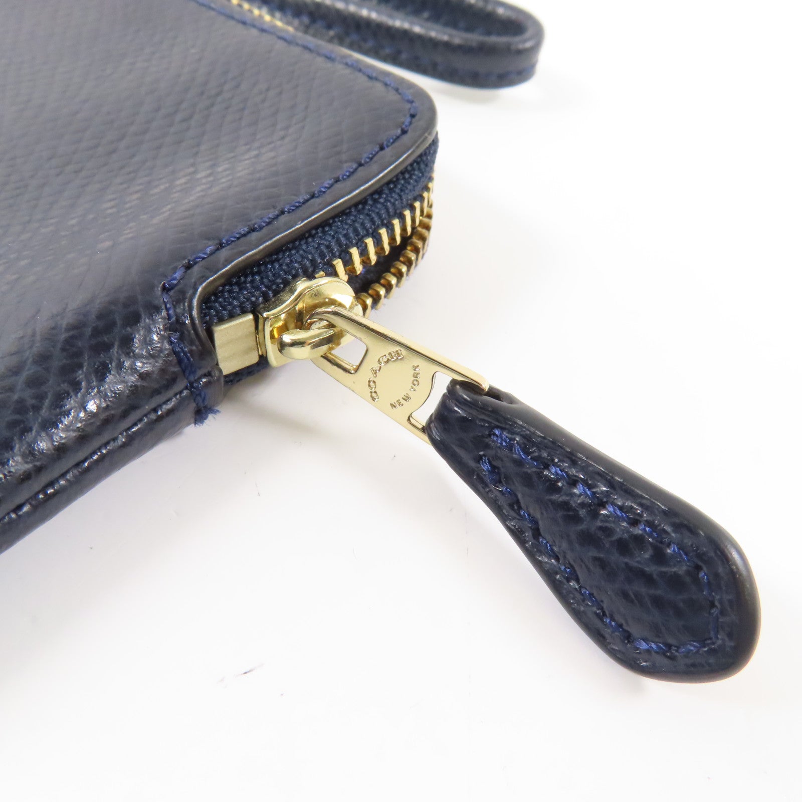 COACH 牛皮皮革Pouch金扣手拿包