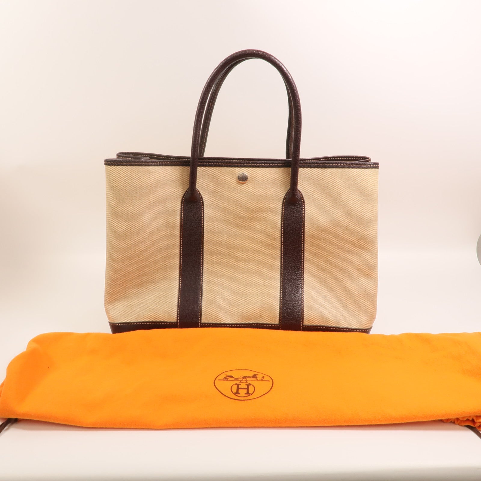HERMES 塗層帆布Garden Party銀扣手挽袋
