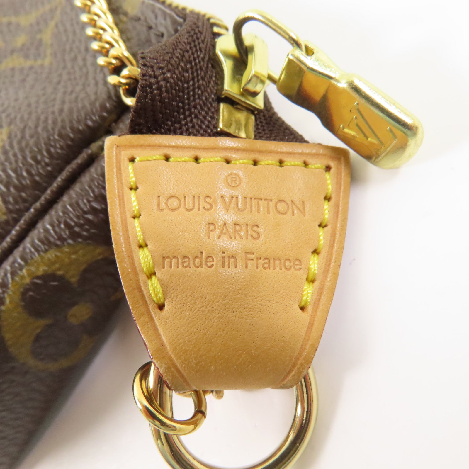 LOUIS VUITTON Monogram Mini Pochette Accessoires金扣手挽袋棕色