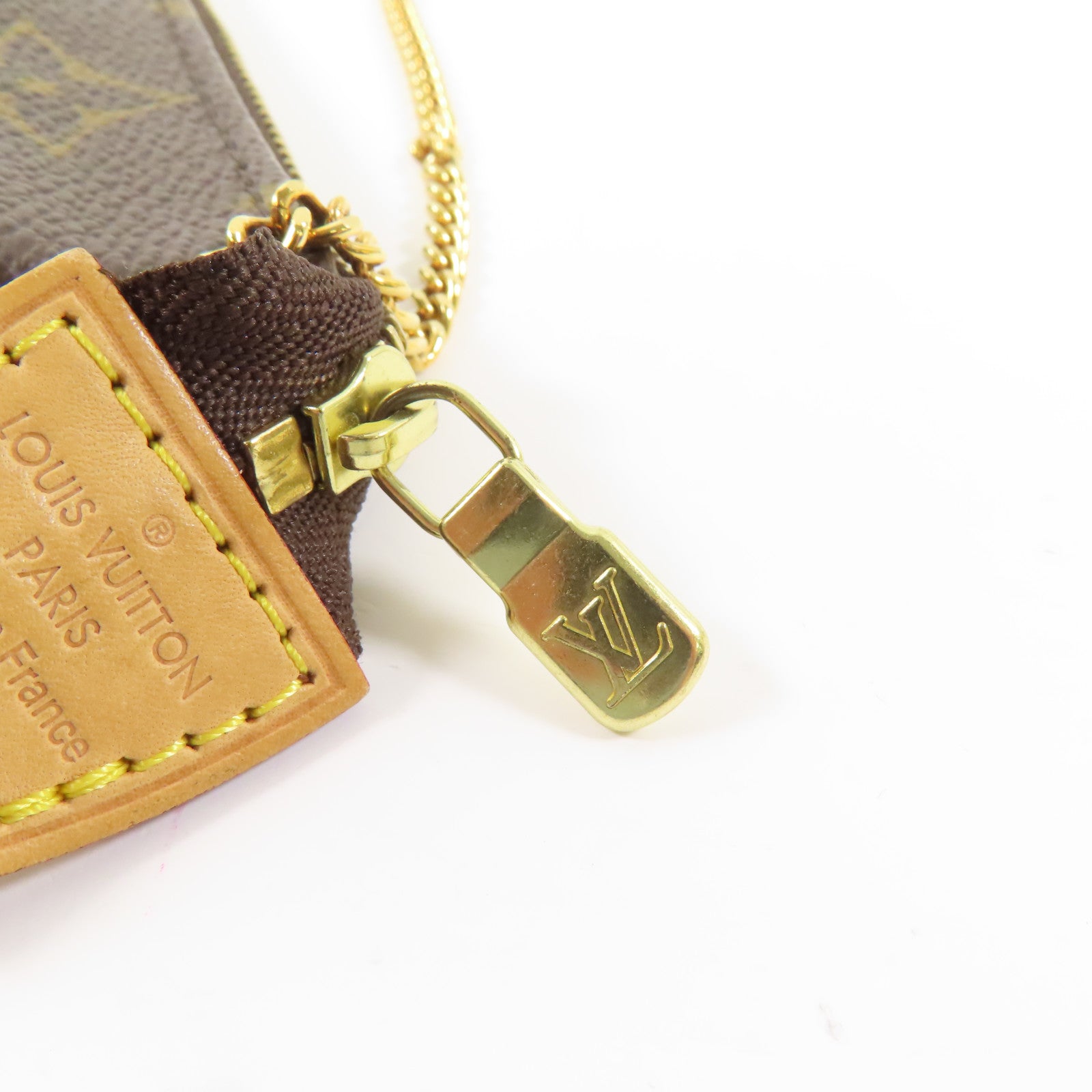 LOUIS VUITTON Monogram Mini Pochette Accessoires金扣手挽袋棕色