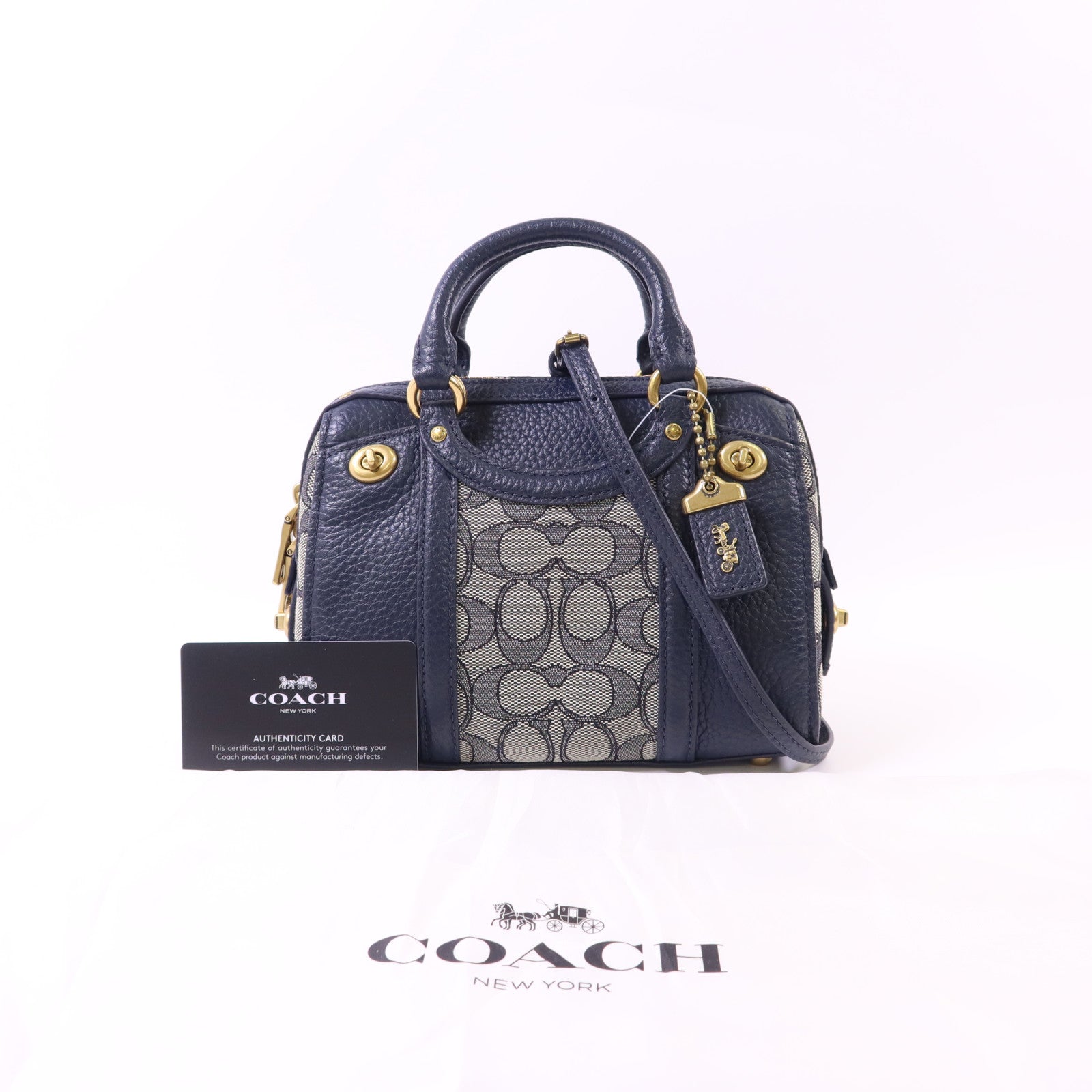 COACH 牛皮皮革/帆布Lark Bag金扣手挽肩背兩用袋