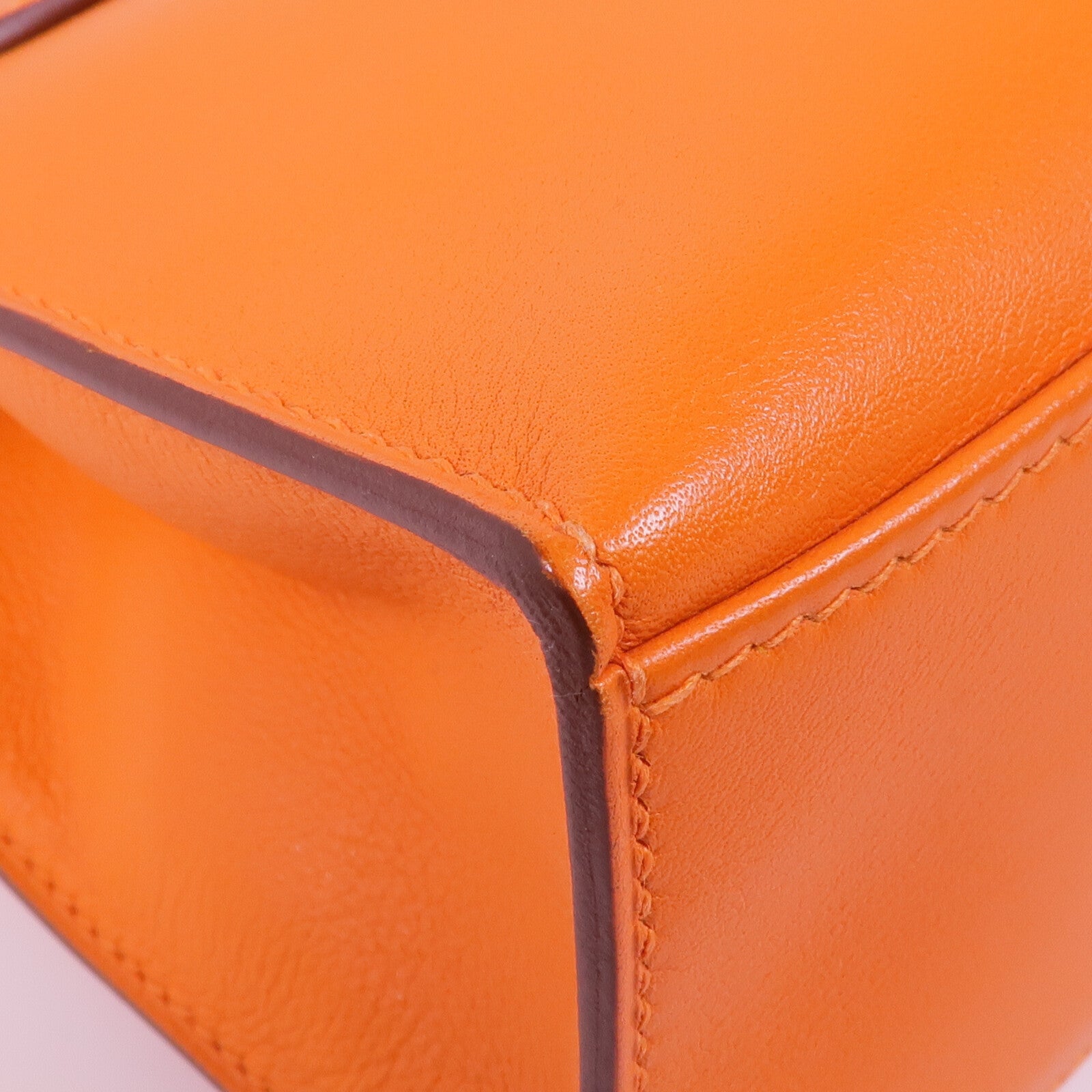 HERMES 【激減優惠】Swift皮革Kelly Pochette銀扣手挽袋Orange