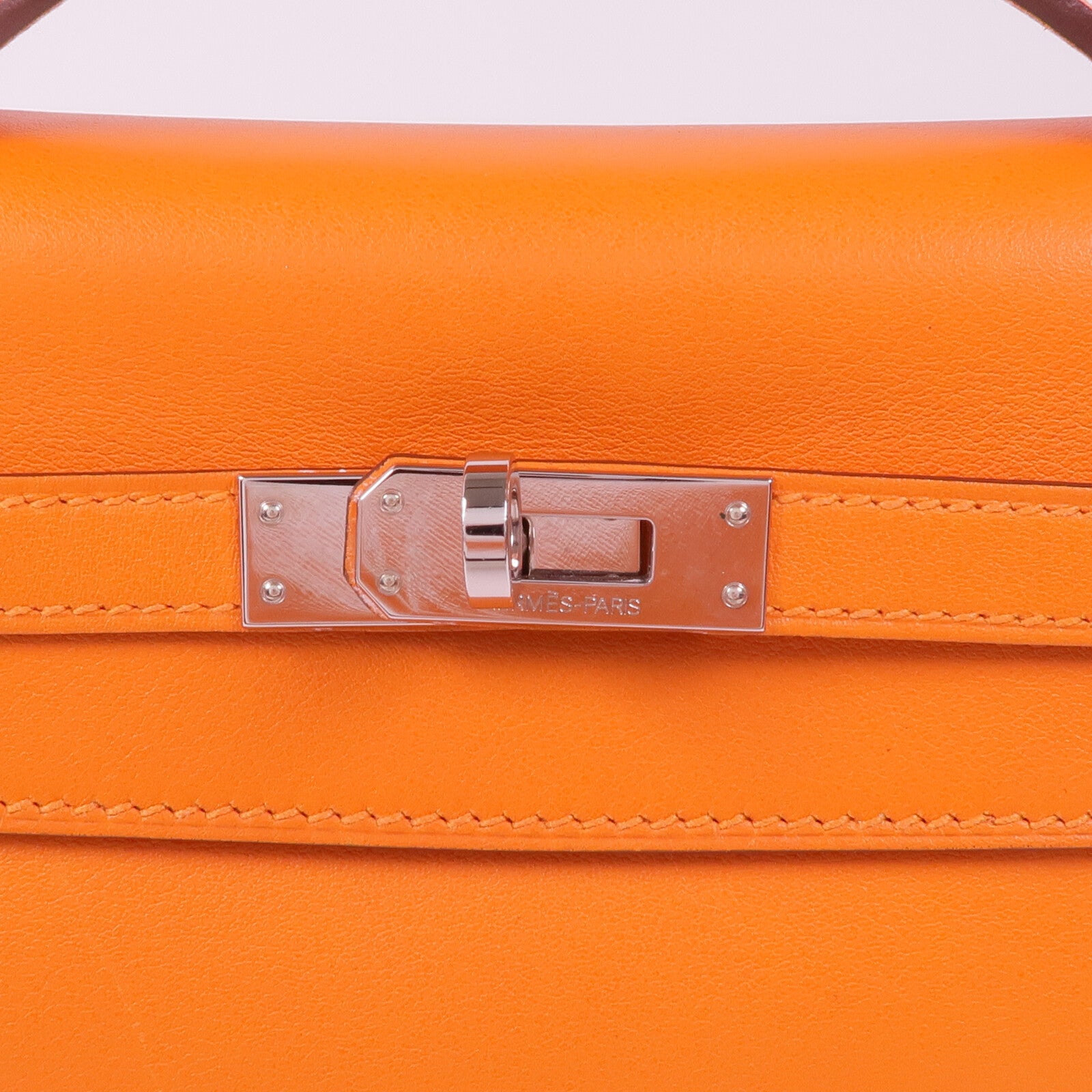 HERMES 【激減優惠】Swift皮革Kelly Pochette銀扣手挽袋Orange