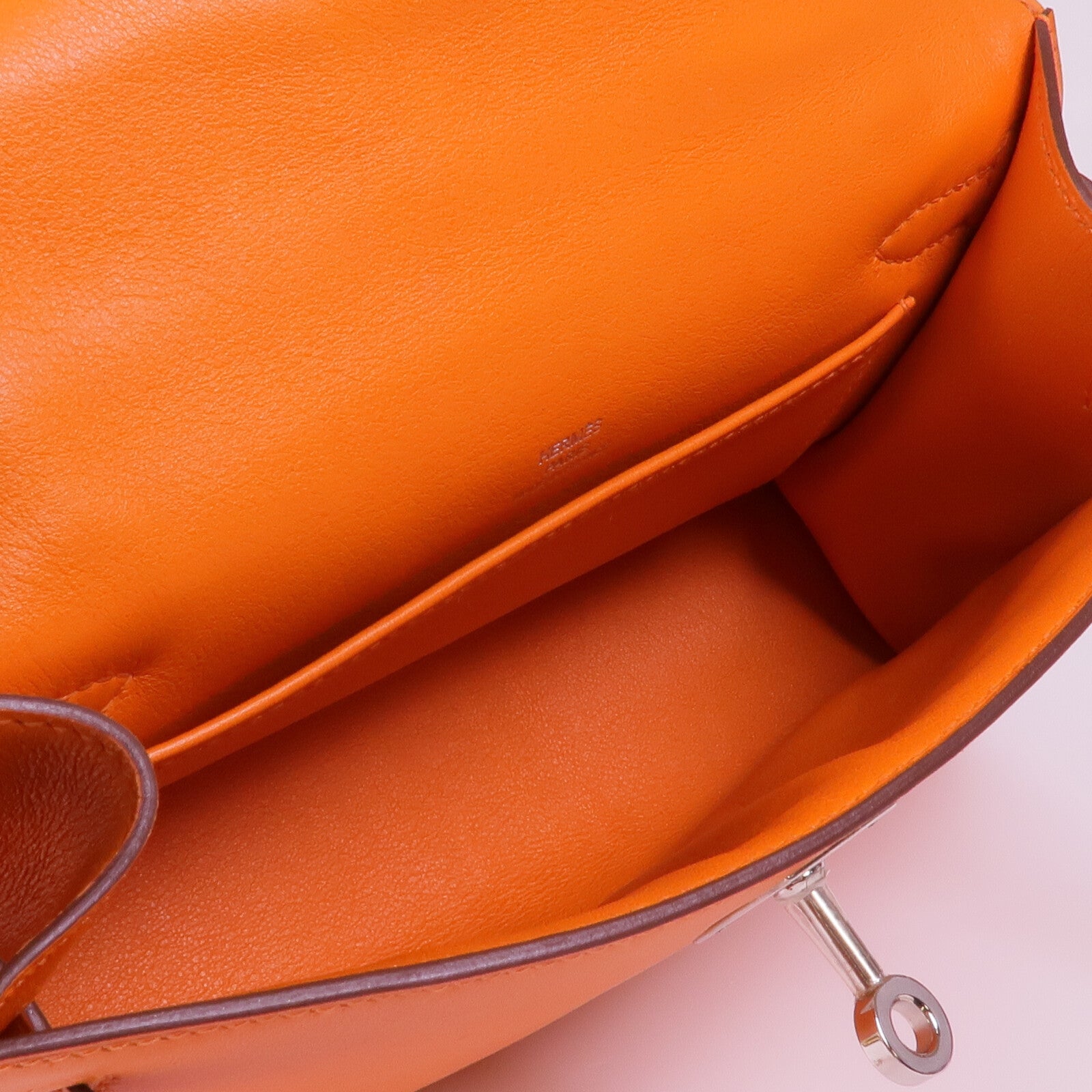 HERMES 【激減優惠】Swift皮革Kelly Pochette銀扣手挽袋Orange