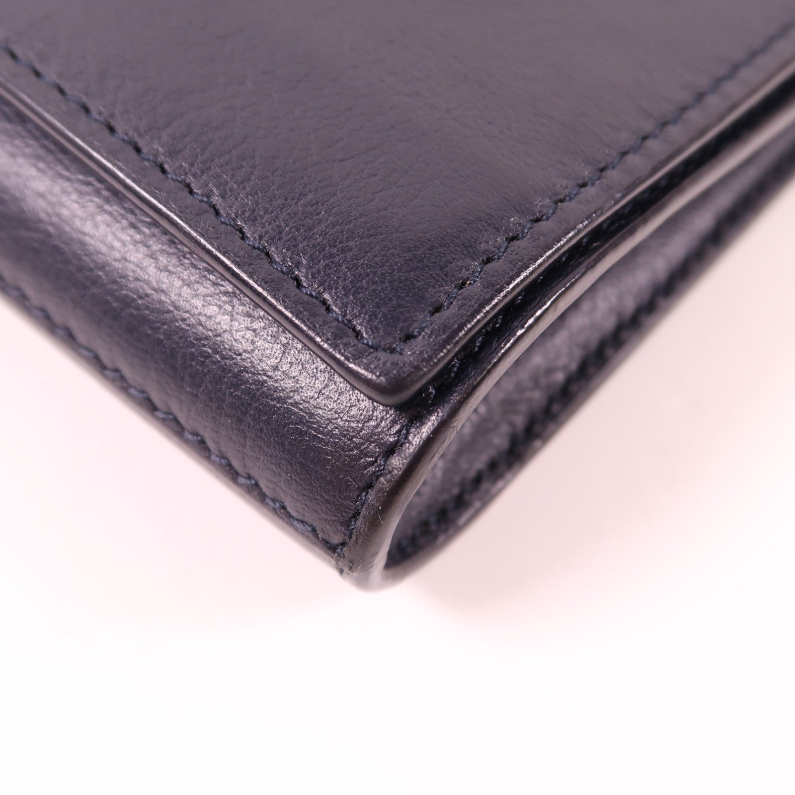 YVES SAINT LAURENT 牛皮皮革Clutch金扣手拿包