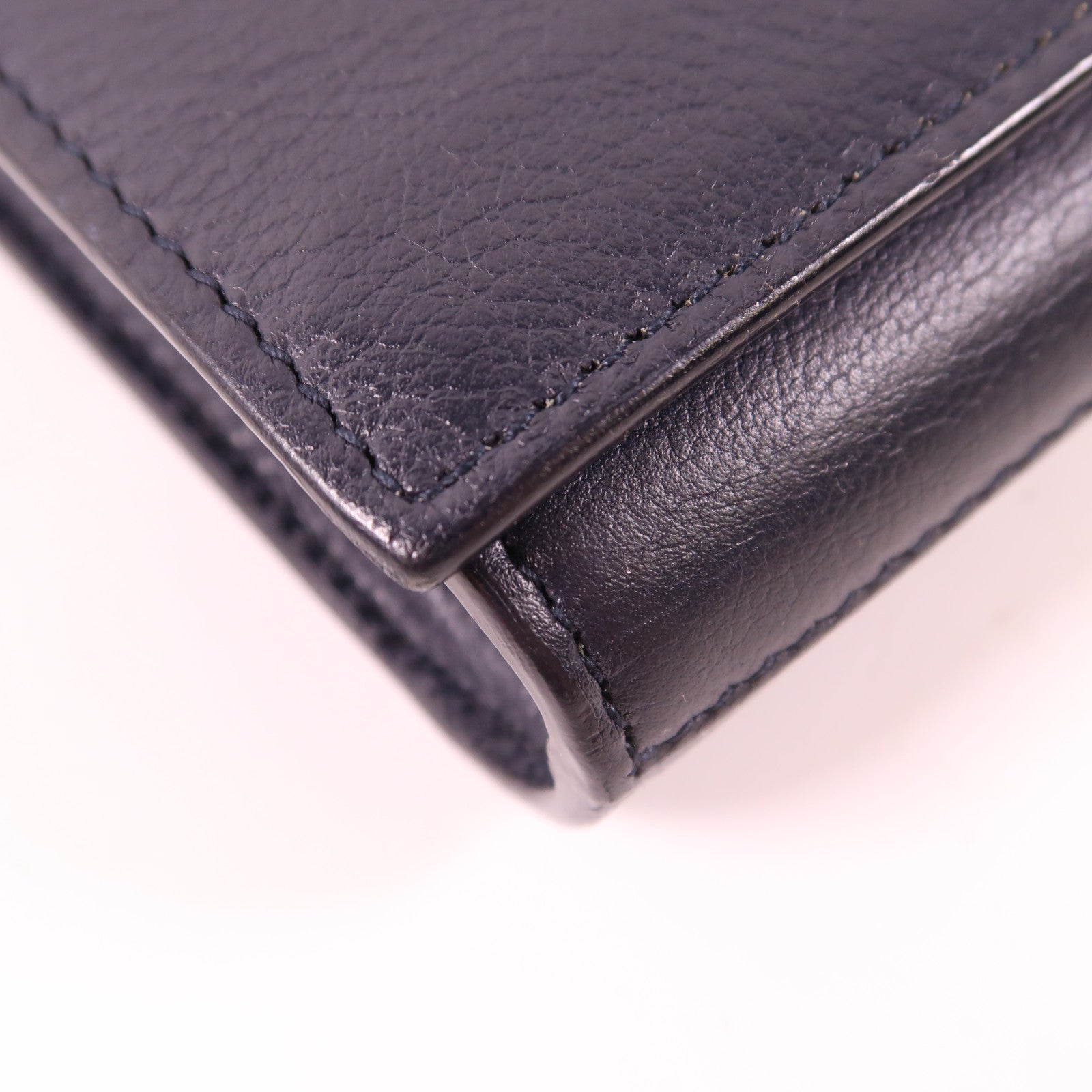 YVES SAINT LAURENT 牛皮皮革Clutch金扣手拿包