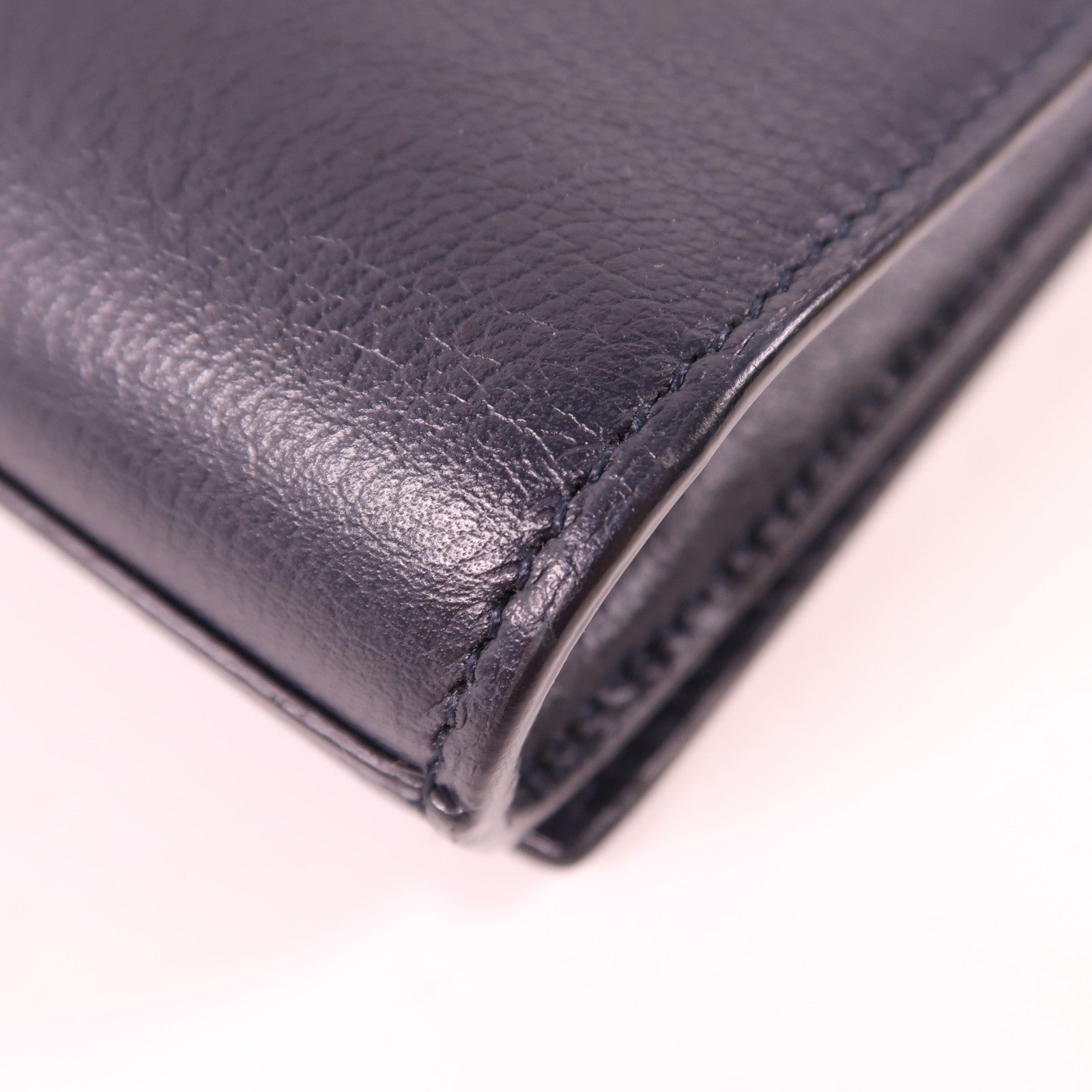 YVES SAINT LAURENT 牛皮皮革Clutch金扣手拿包