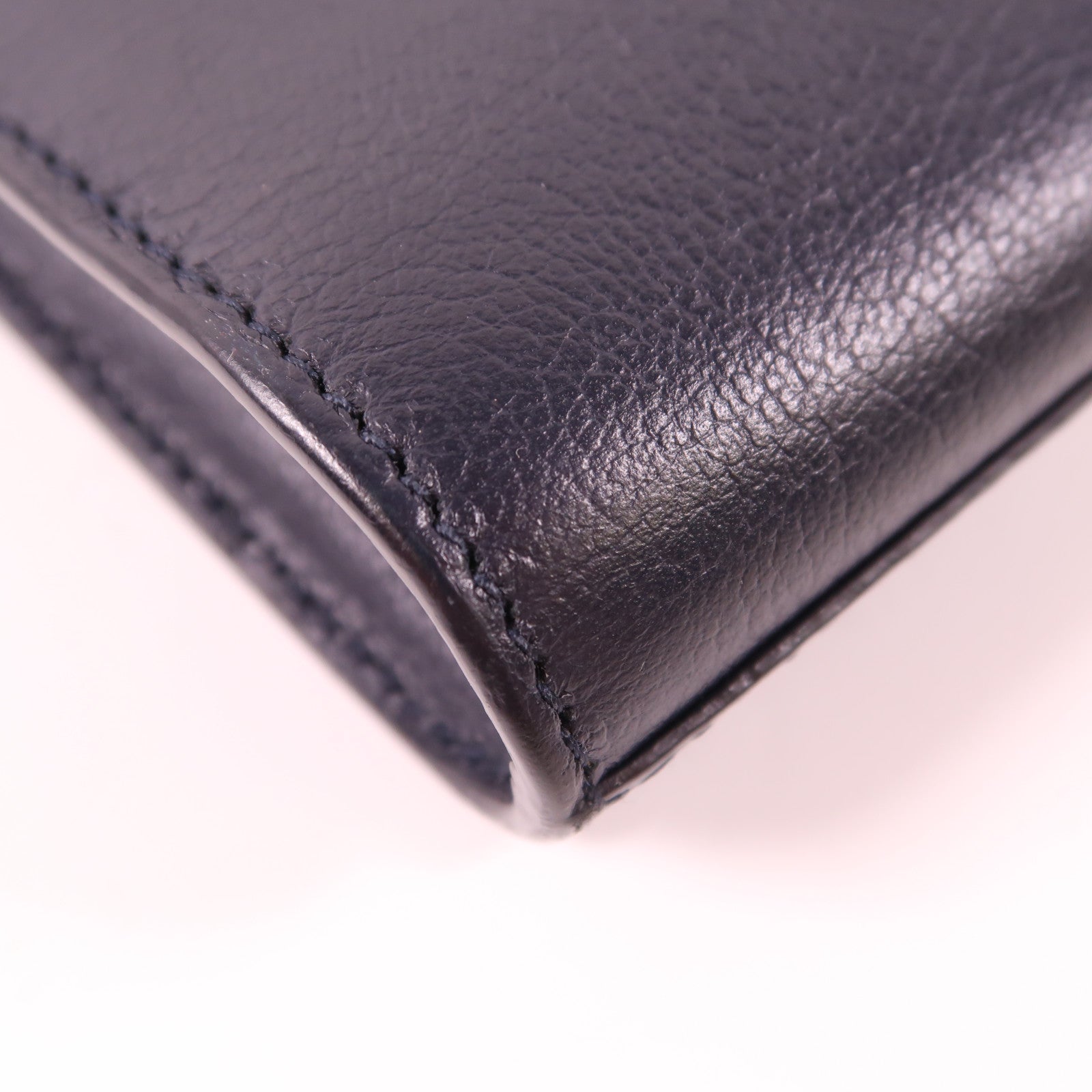 YVES SAINT LAURENT 牛皮皮革Clutch金扣手拿包