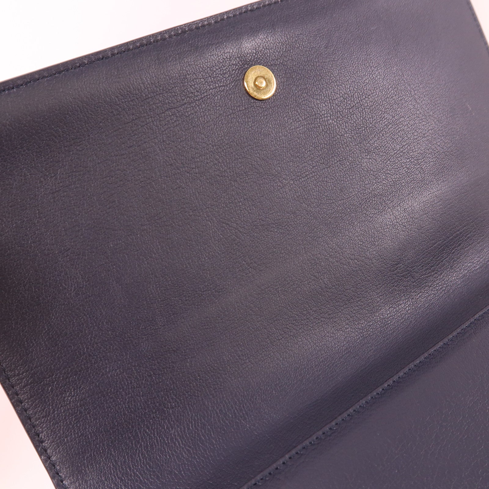 YVES SAINT LAURENT 牛皮皮革Clutch金扣手拿包