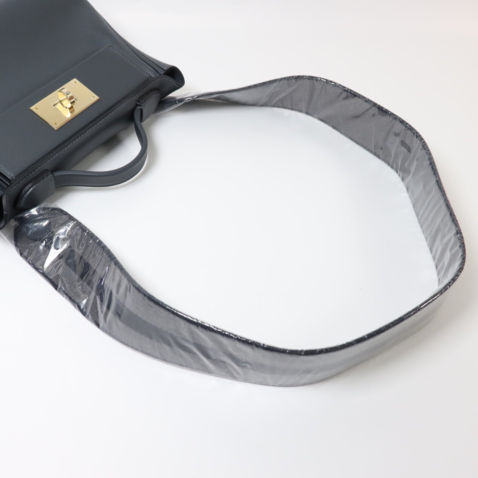 HERMES Swift皮革24/24 Mini金手扣手挽肩背兩用袋Gris Misty