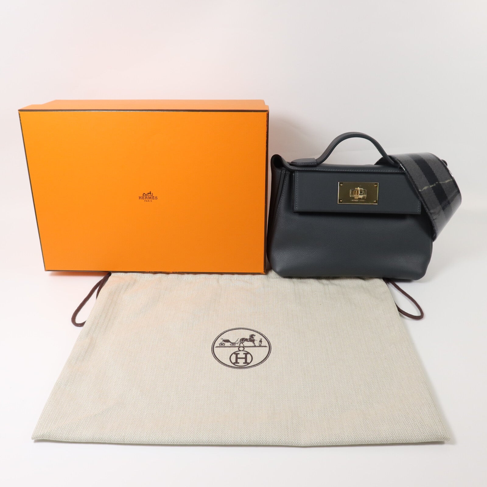 HERMES Swift皮革24/24 Mini金手扣手挽肩背兩用袋Gris Misty