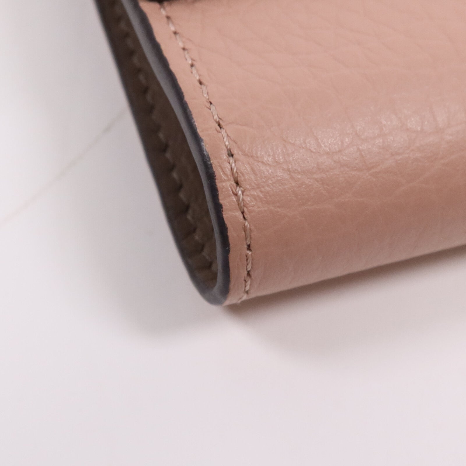 LOUIS VUITTON Taurillon皮革Capucines Compact銀扣錢包