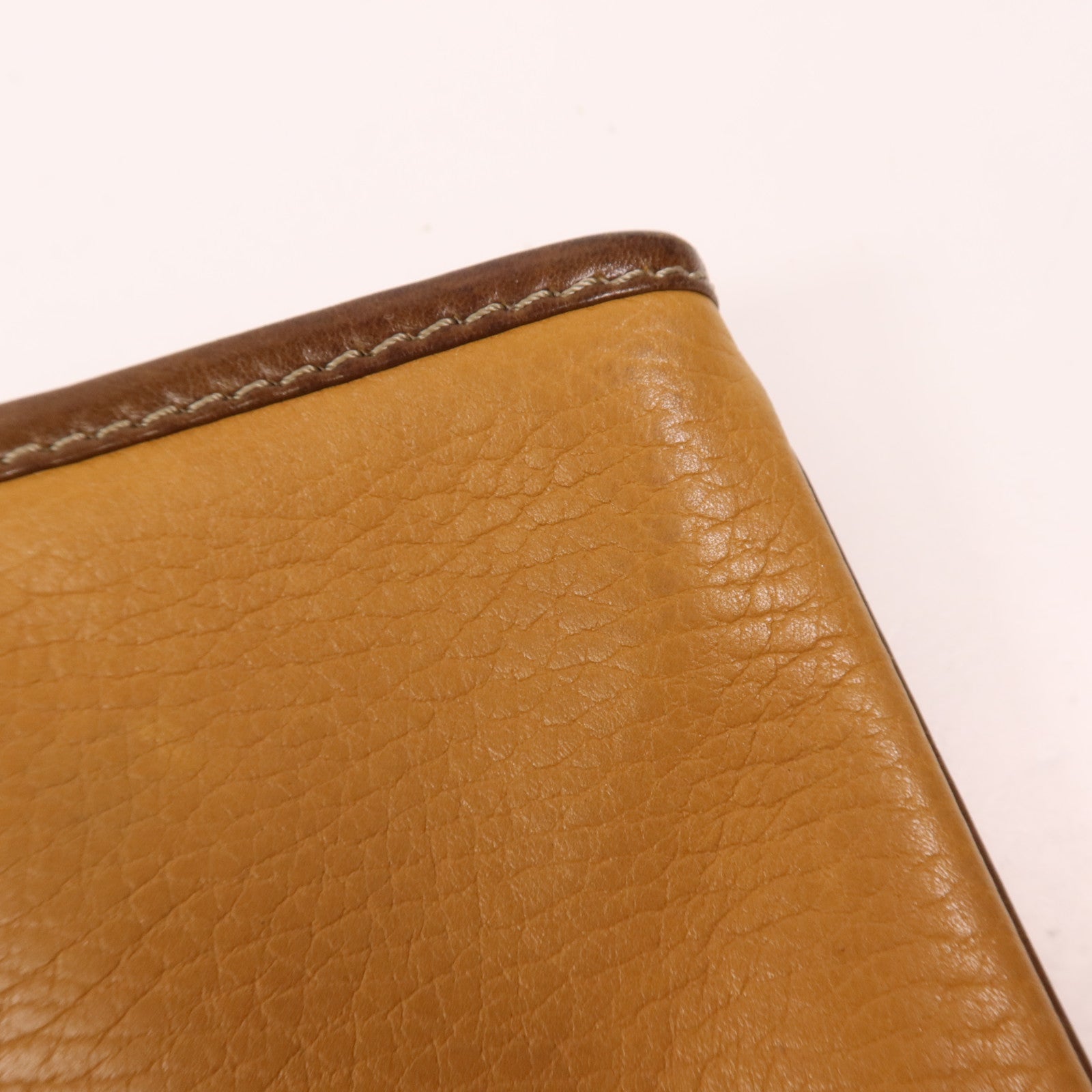 LOEWE 牛皮皮革Pouch金扣手拿包