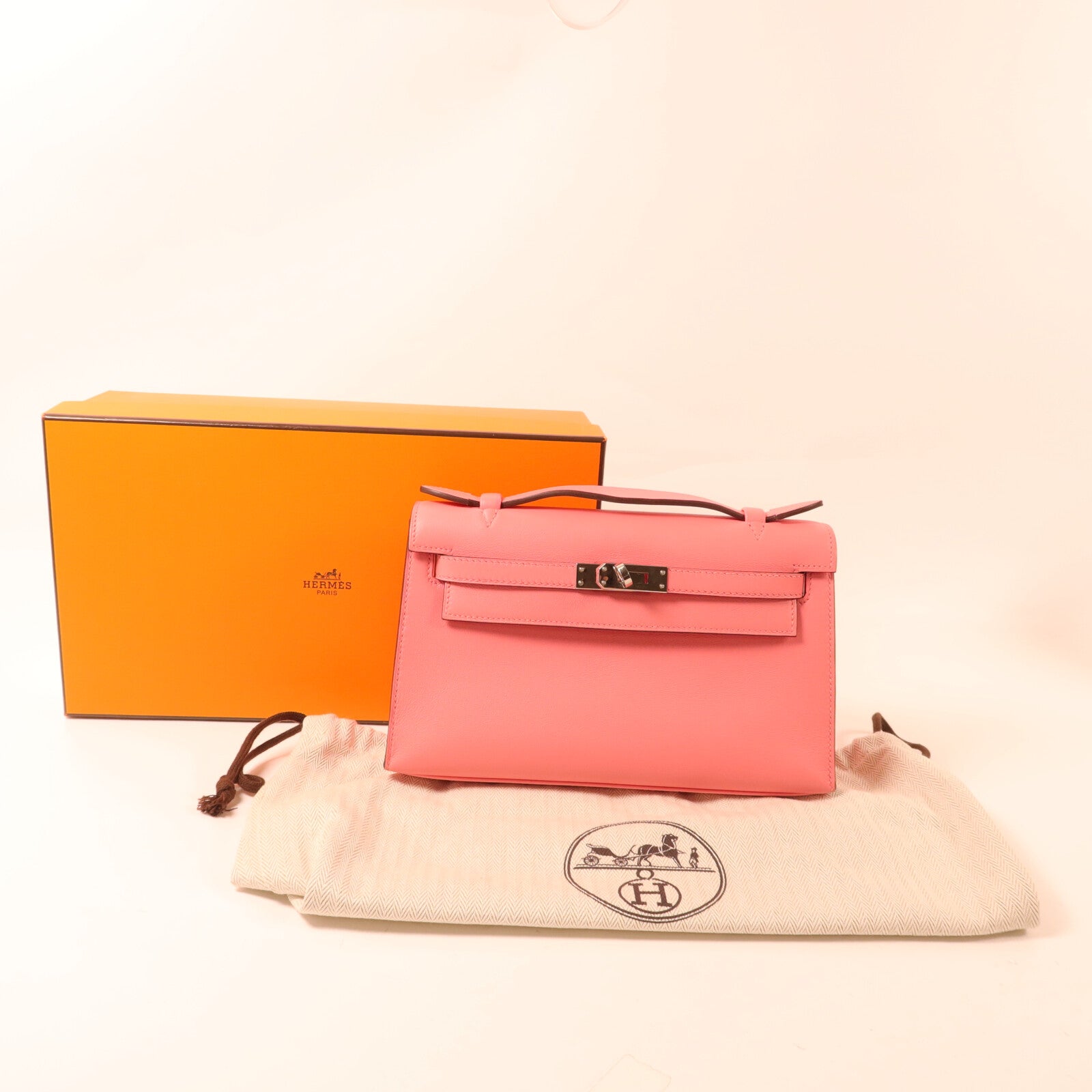 HERMES Swift皮革Kelly Pochette手挽袋Rose d'Ete