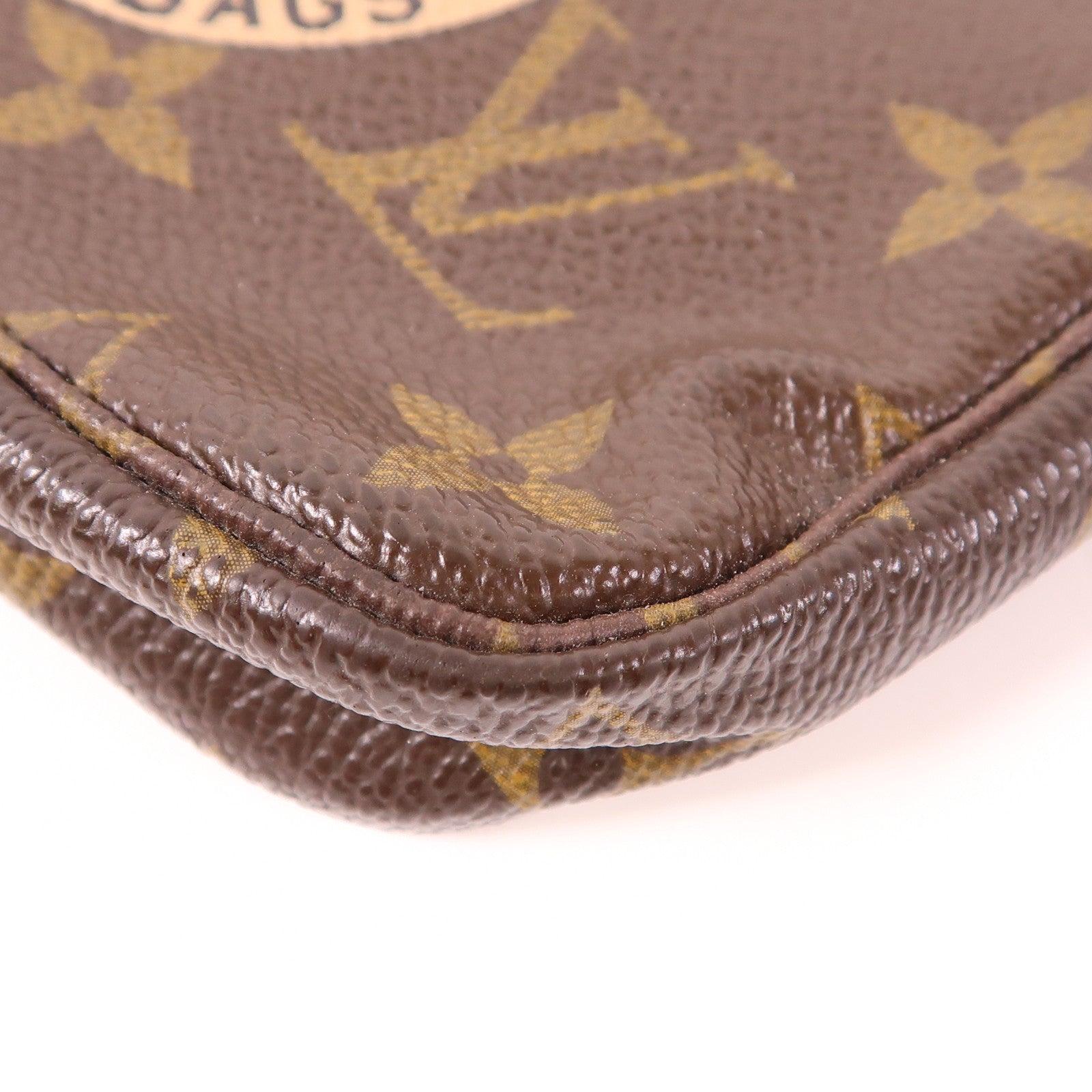 LOUIS VUITTON 【萬聖節商品】Monogram Mini Pochette Accessoires金扣手挽袋