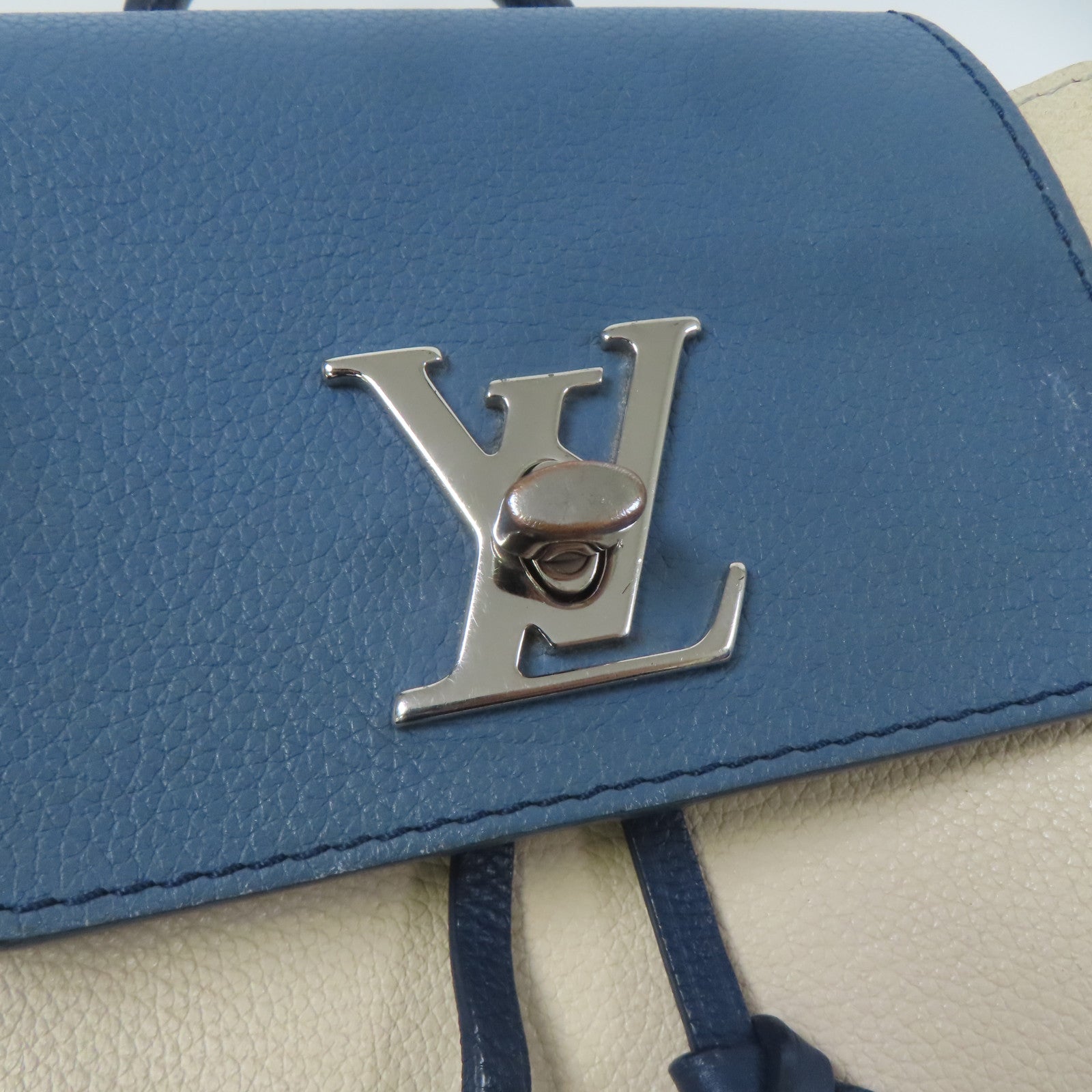 LOUIS VUITTON 牛皮皮革Lockme Backpack銀扣背包米色/藍色