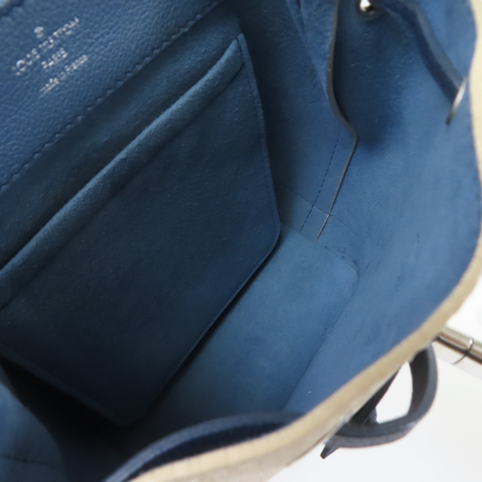 LOUIS VUITTON 牛皮皮革Lockme Backpack銀扣背包米色/藍色
