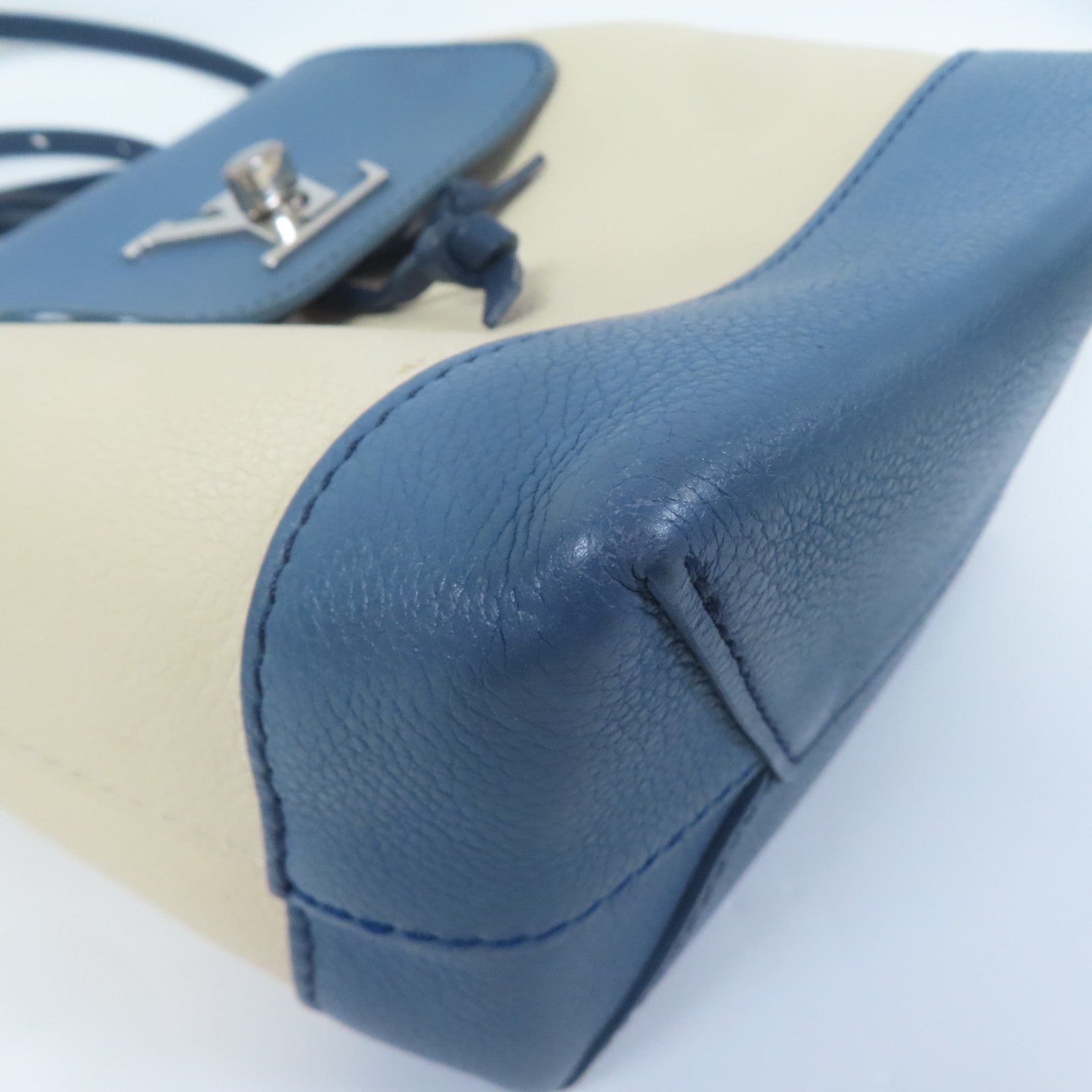 LOUIS VUITTON 牛皮皮革Lockme Backpack銀扣背包米色/藍色