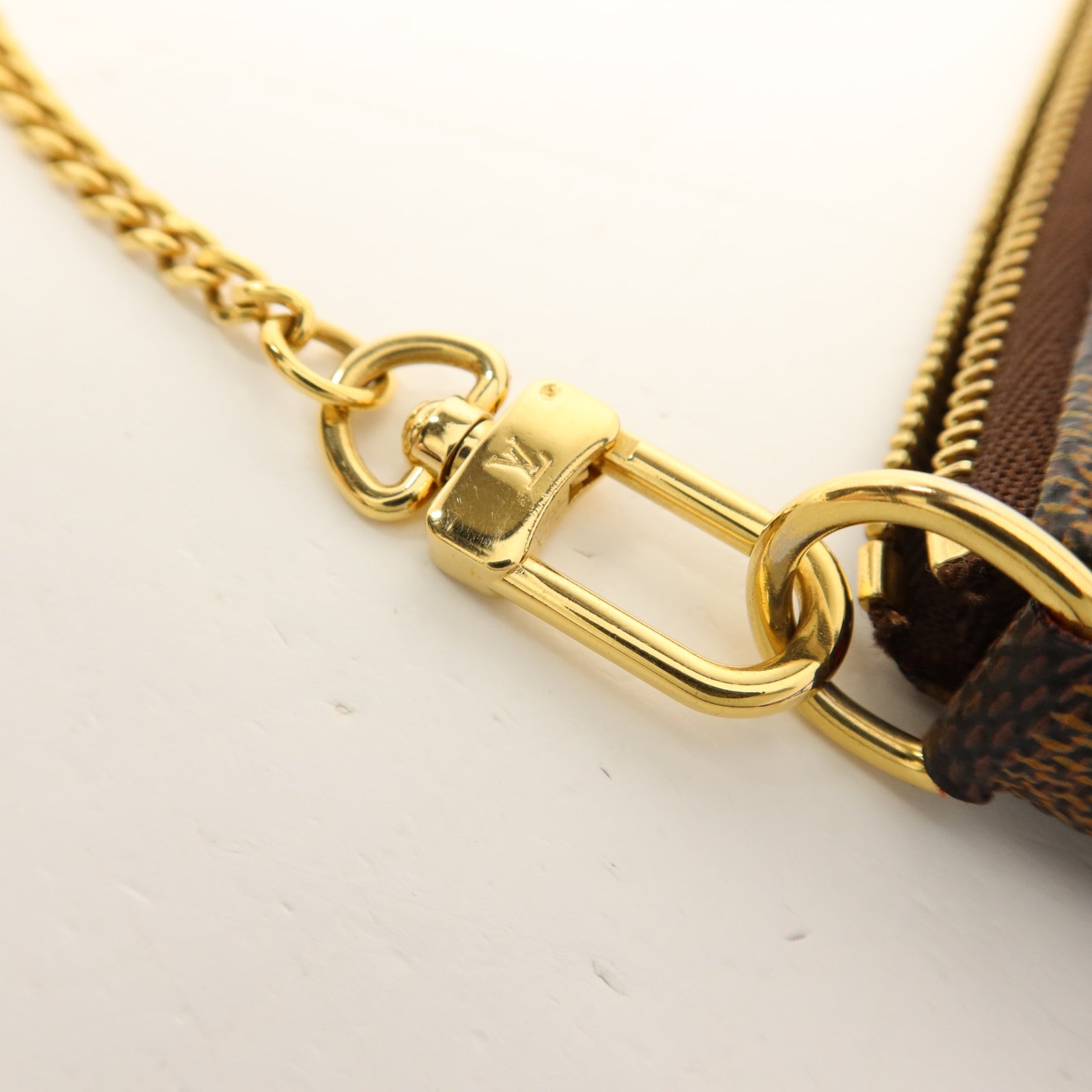 LOUIS VUITTON Monogram Mini Pochette Accessoires金扣手挽袋