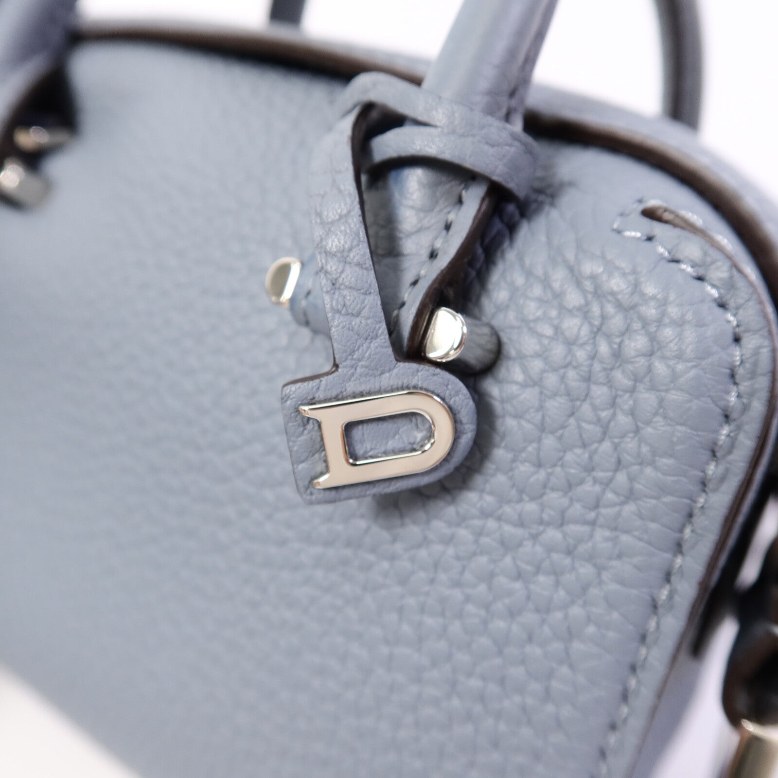 Delvaux Taurillon Soft Cool Box Nano手挽肩背兩用袋