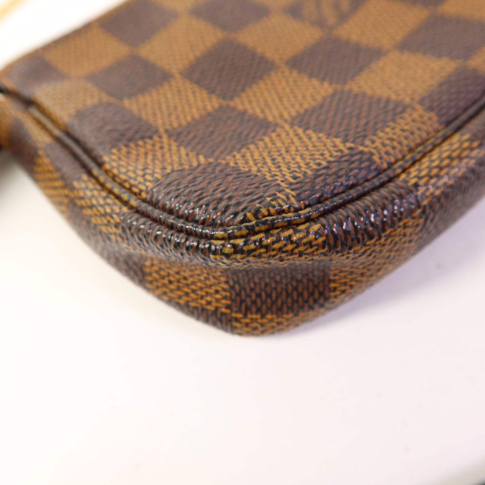 LOUIS VUITTON Monogram Mini Pochette Accessoires金扣手挽袋