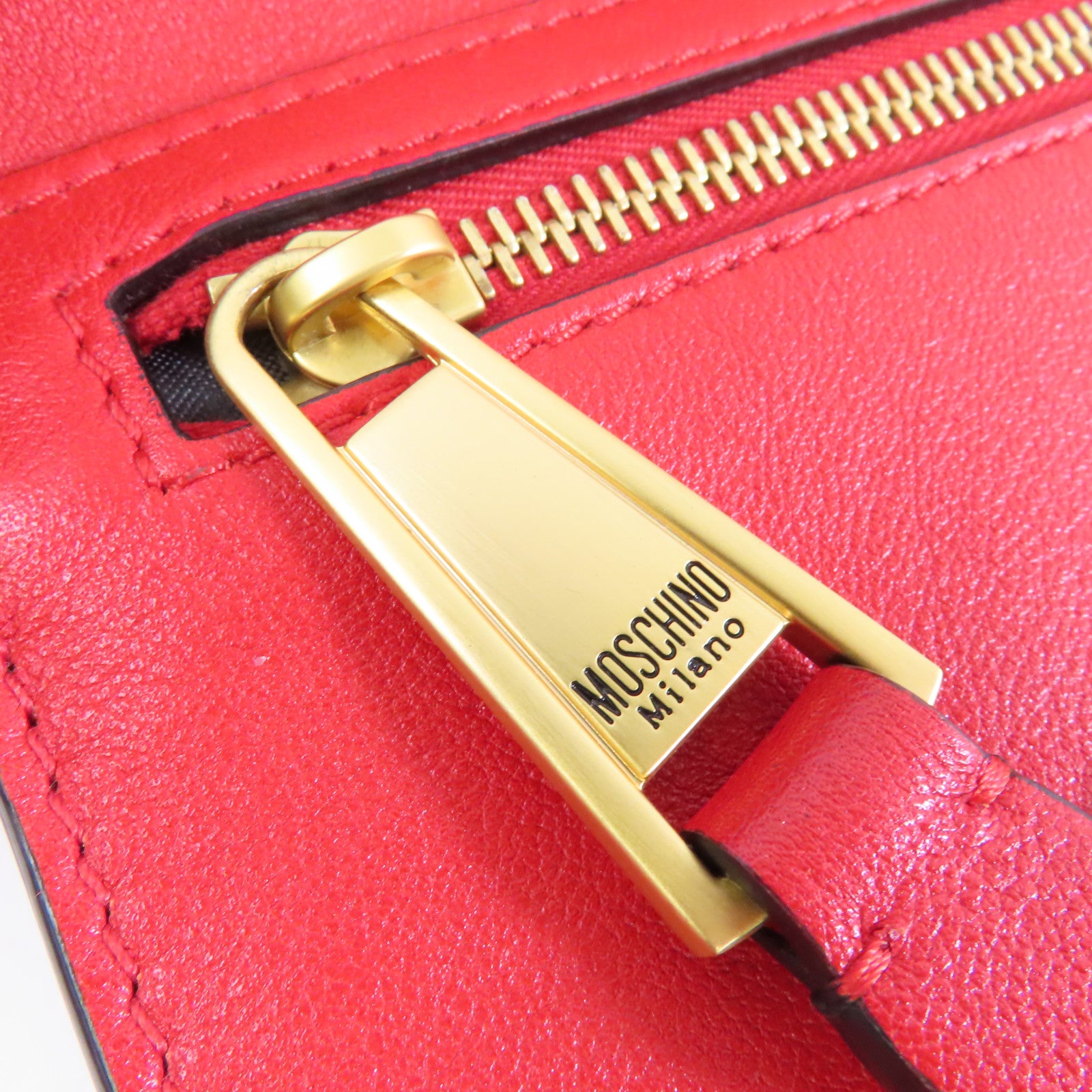 MOSCHINO 牛皮皮革Clutch Bag金扣手拿包紅色