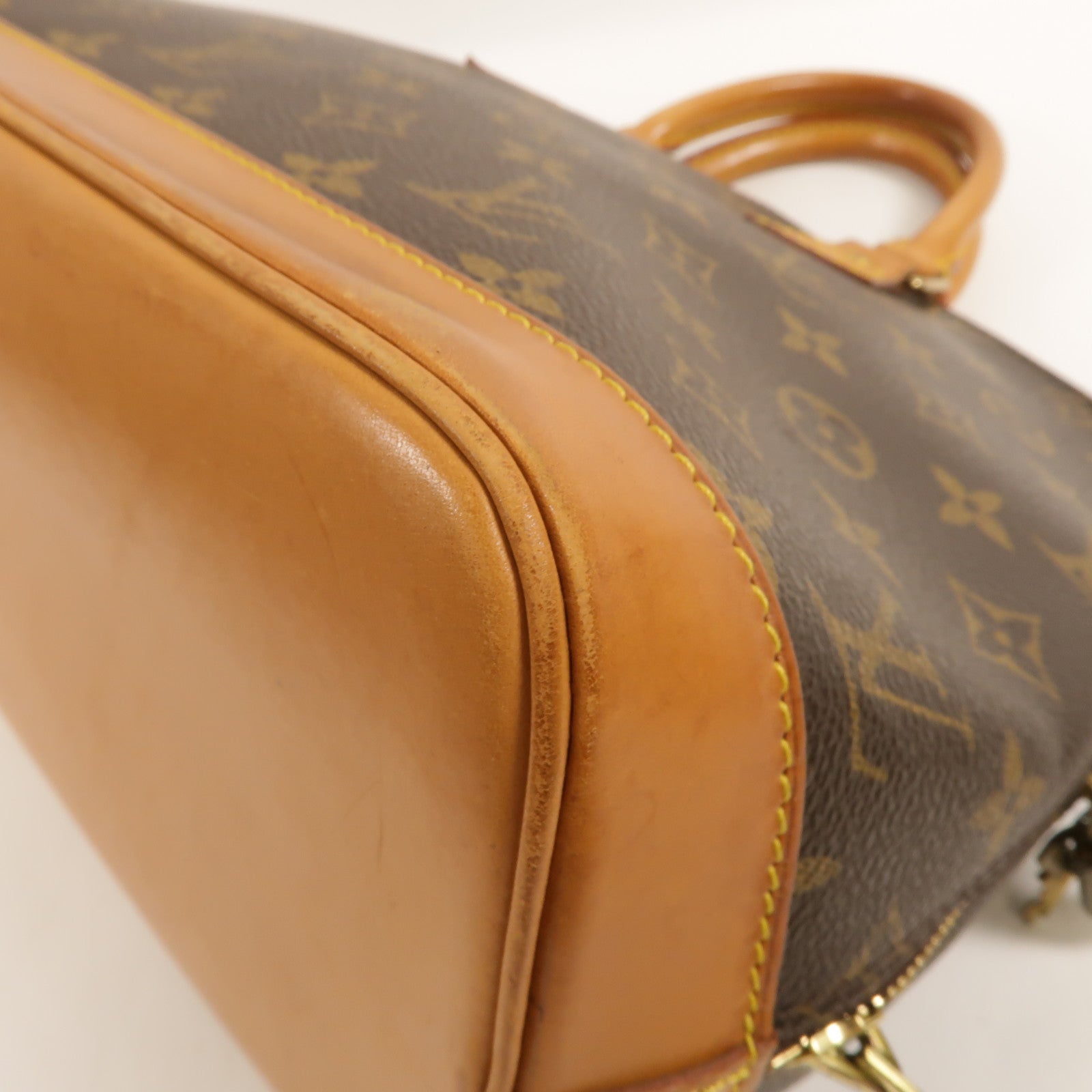 LOUIS VUITTON Monogram Alma金扣手挽袋棕色
