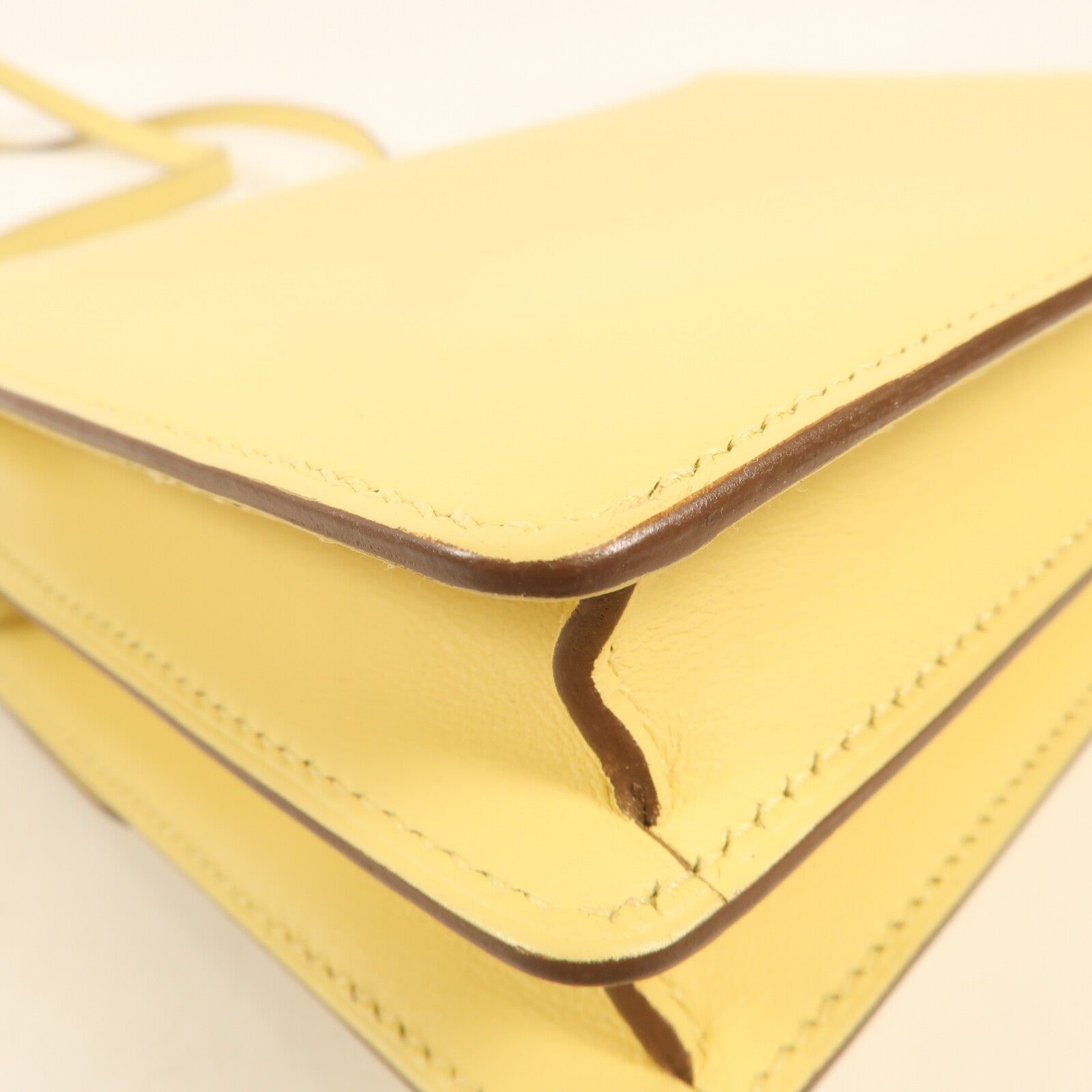 HERMES Swift皮革Mini Roulis金扣肩背袋Jaune Bourgeon