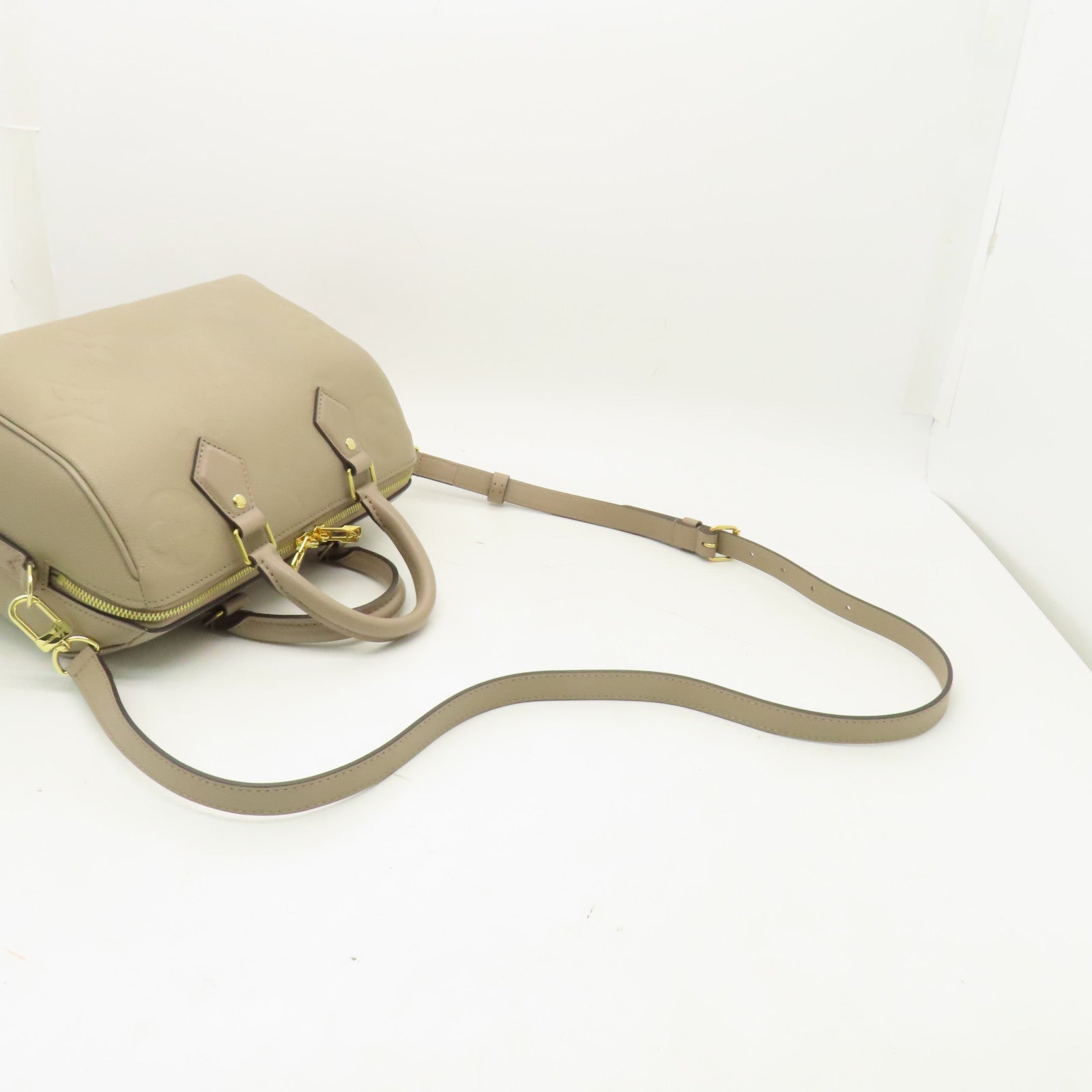 LOUIS VUITTON 【激減優惠】Monogram Empreinte Speedy Bandouliere 25金扣手挽肩背兩用袋米色
